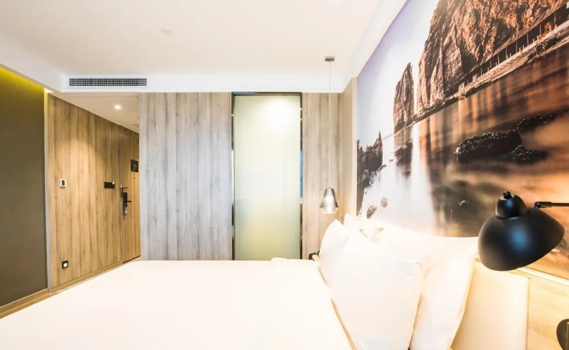 Bed in Atour Hotel Weihai City Center