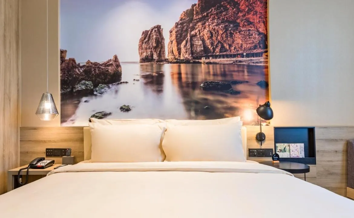 Bed in Atour Hotel Weihai City Center