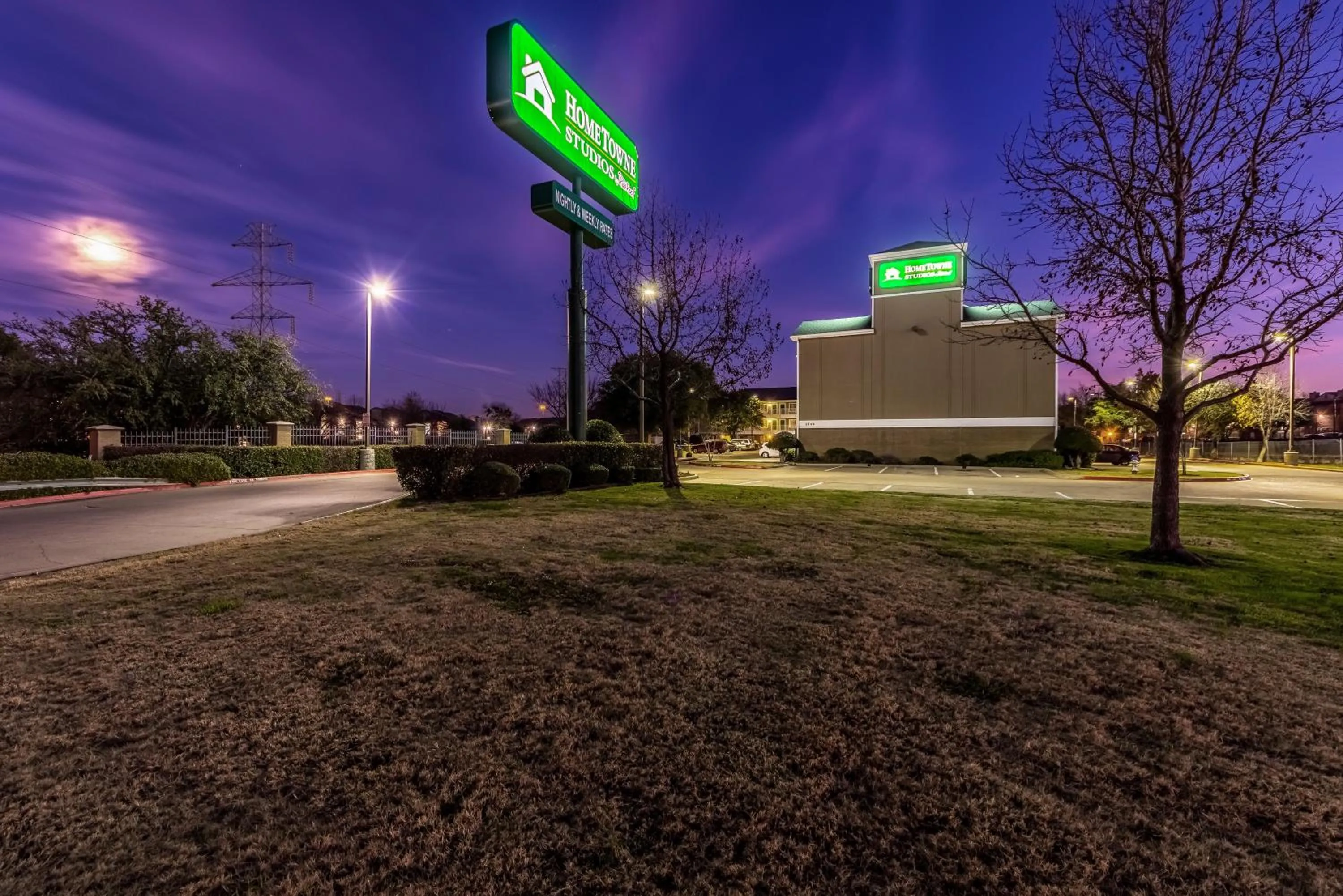 Property building in HomeTowne Studios by Red Roof Dallas - Mesquite