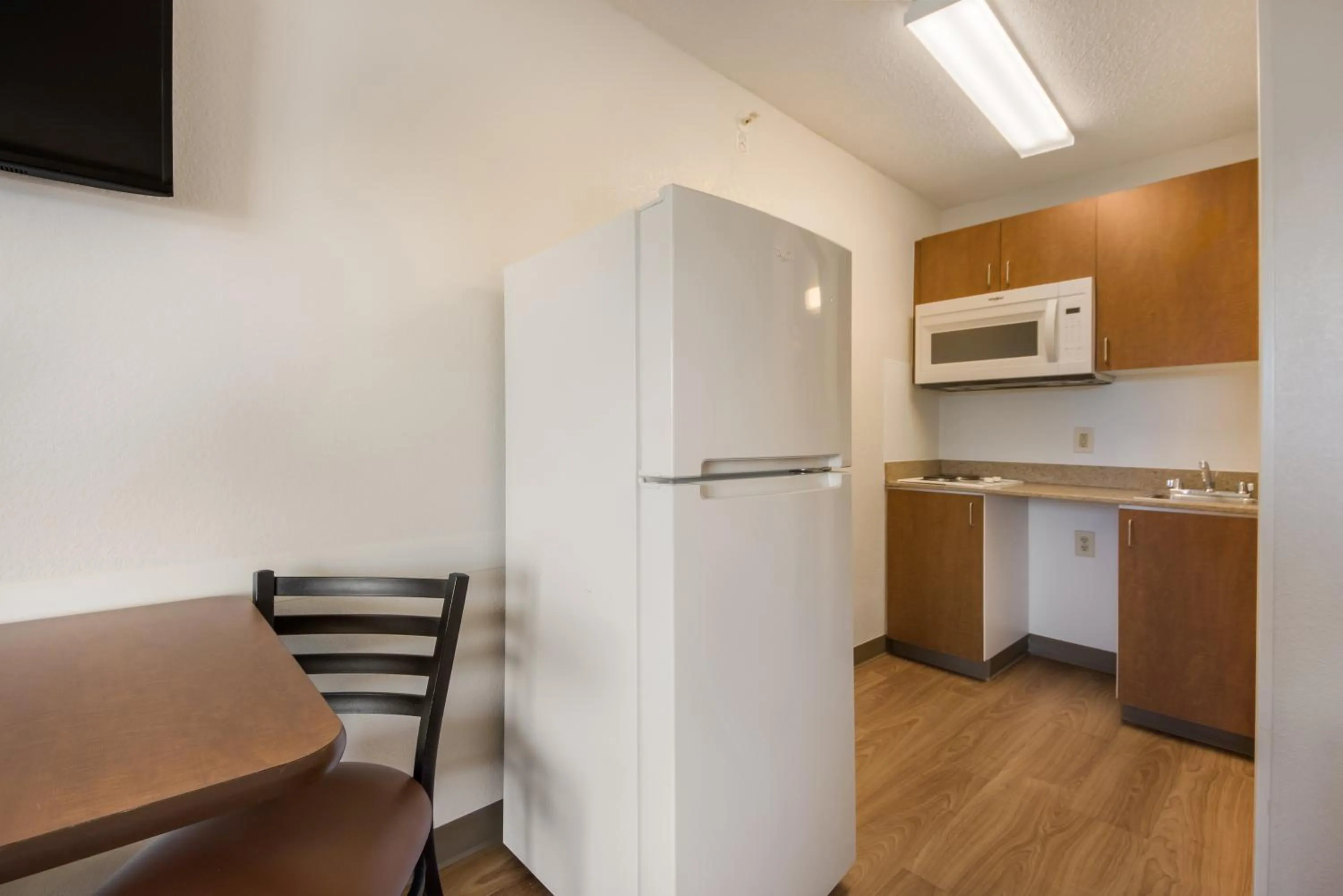 Photo of the whole room in HomeTowne Studios by Red Roof Dallas - Mesquite