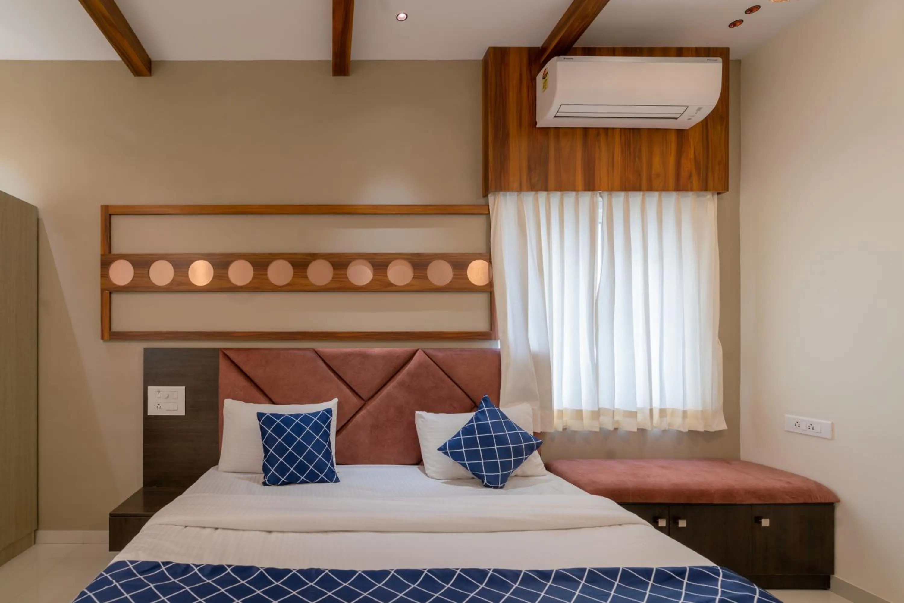 Bed in THE SURRYA MAX RESIDENCY