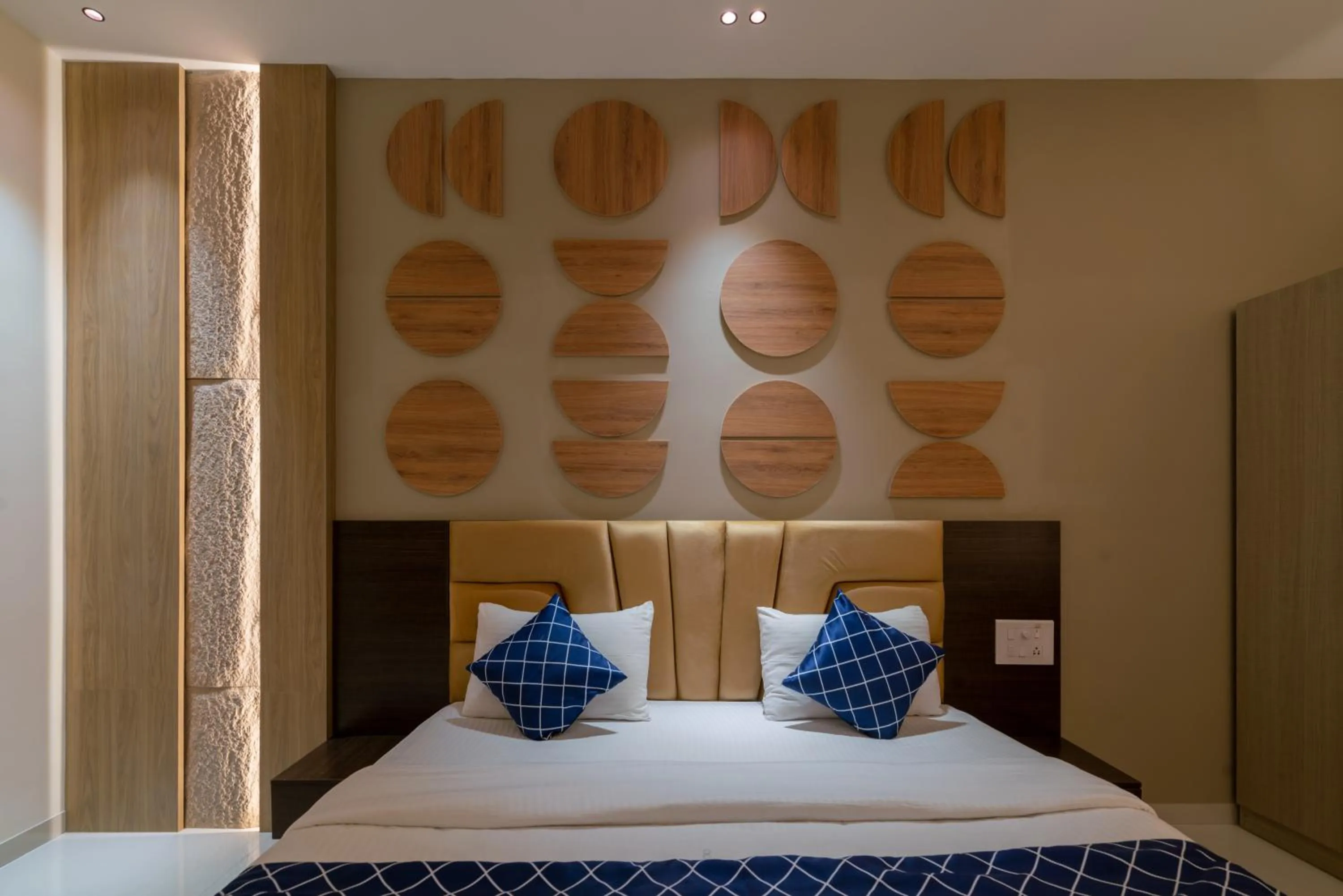 Bed in THE SURRYA MAX RESIDENCY