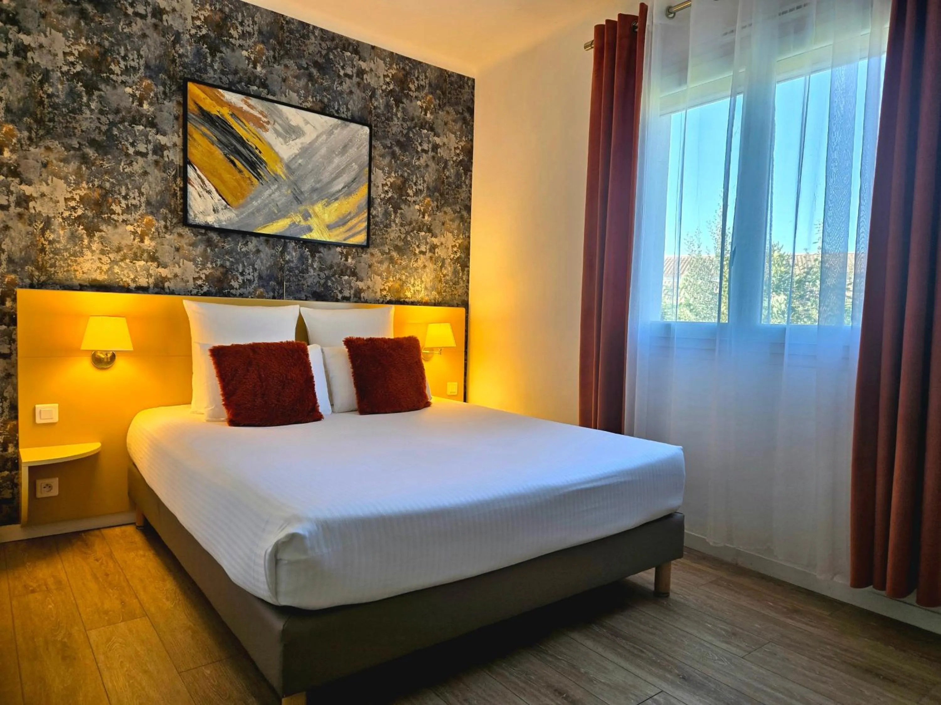 Bed in Hôtel Le SAINT-GENIÈS