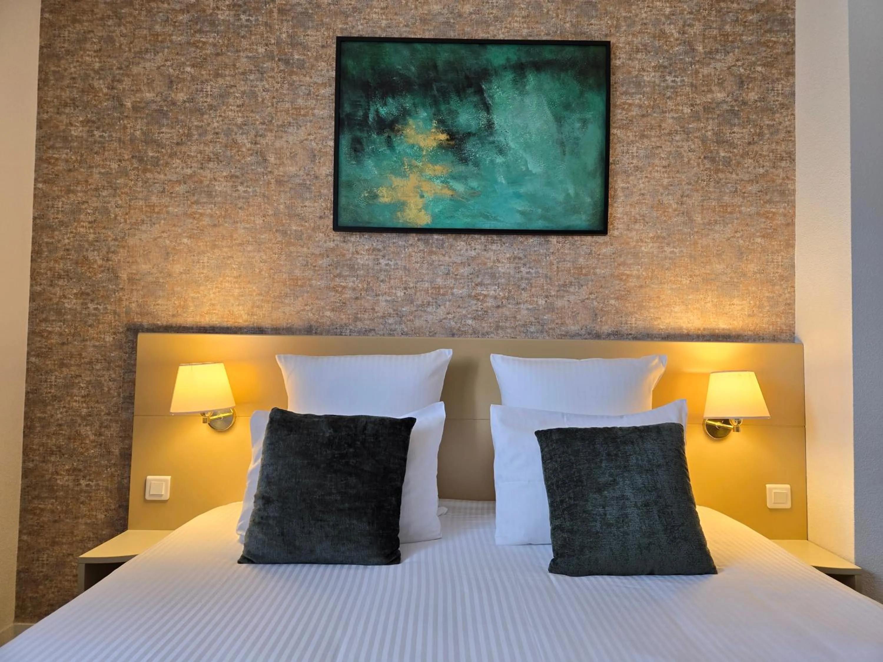 Bed in Hôtel Le SAINT-GENIÈS