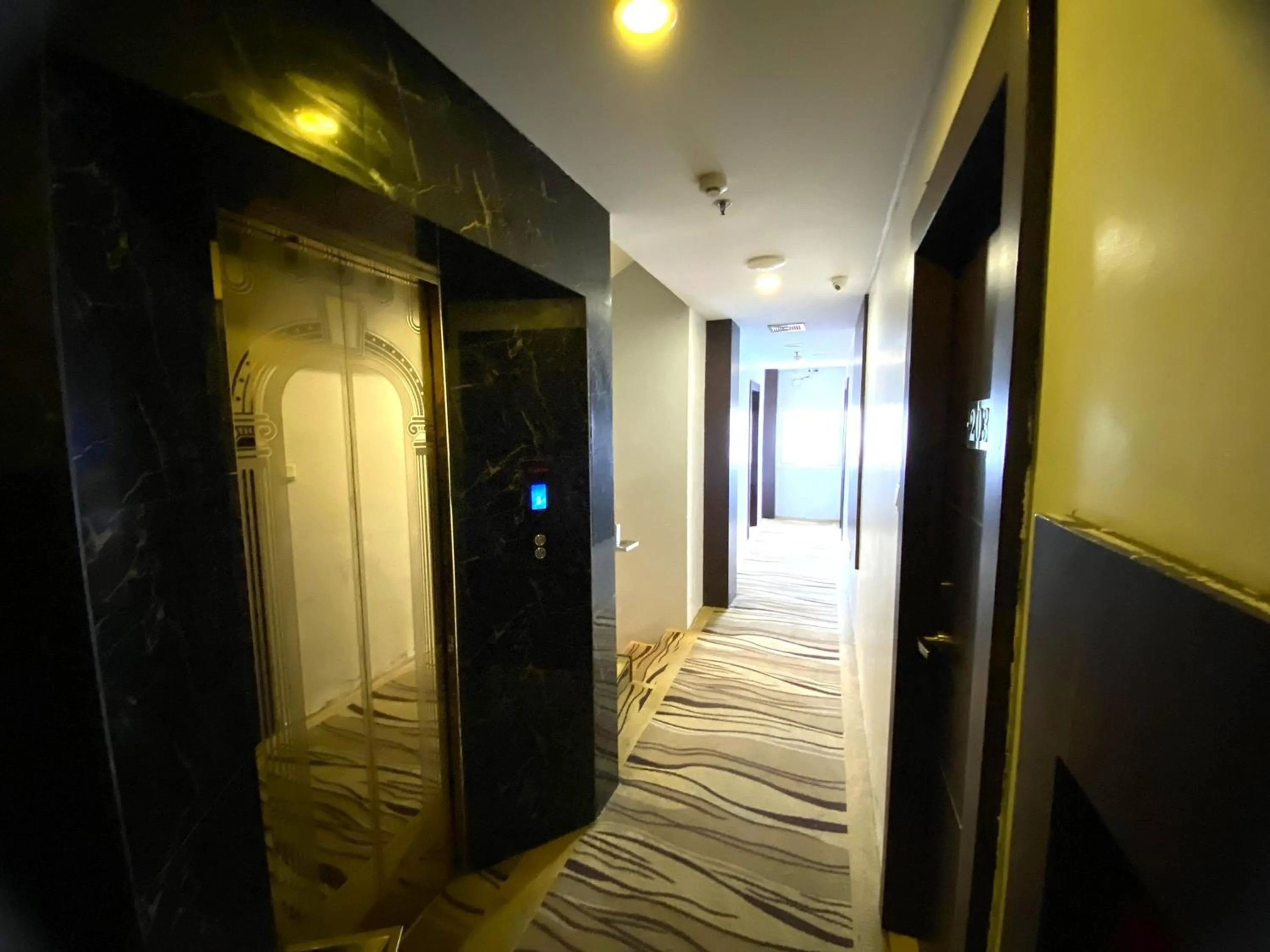 elevator in Lucky Star Hotel Near Harbour Bay Batam