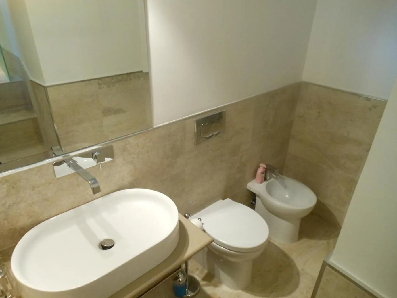Toilet in Vatican Studio Apartment
