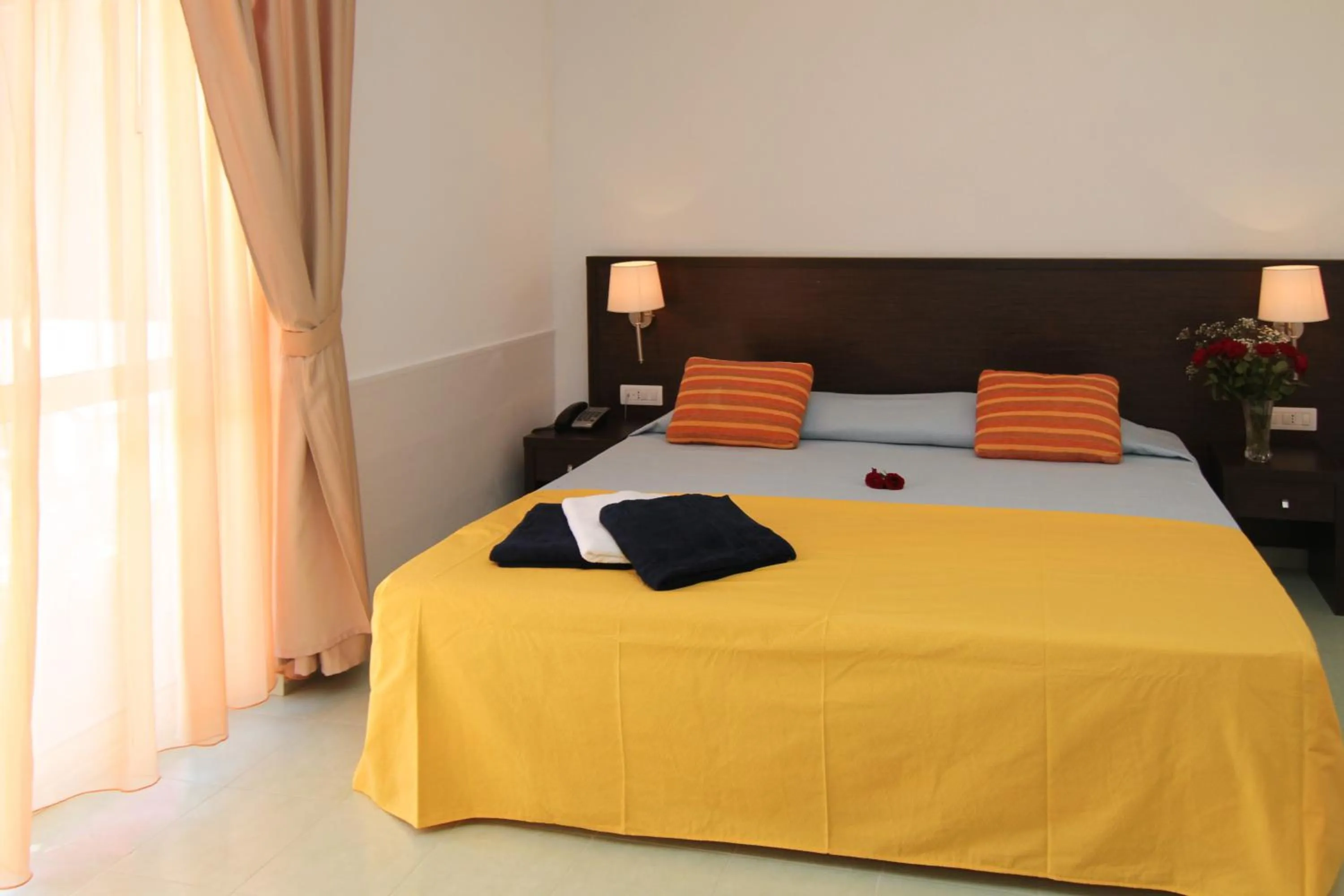 Bed in Club Esse Sunbeach