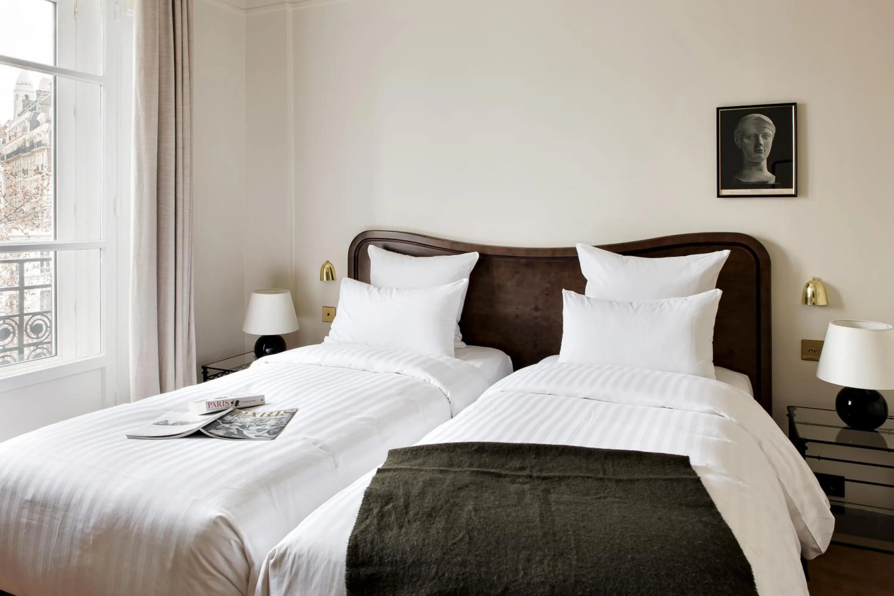 Bed in Hotel Rochechouart, a Member of Design Hotels