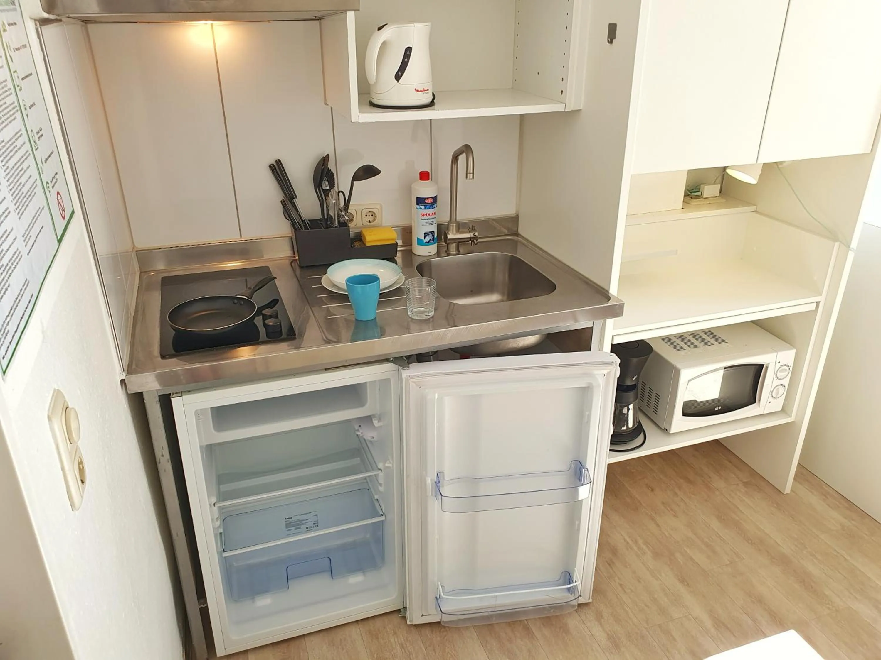 Kitchen or kitchenette in Aparthotel B & L