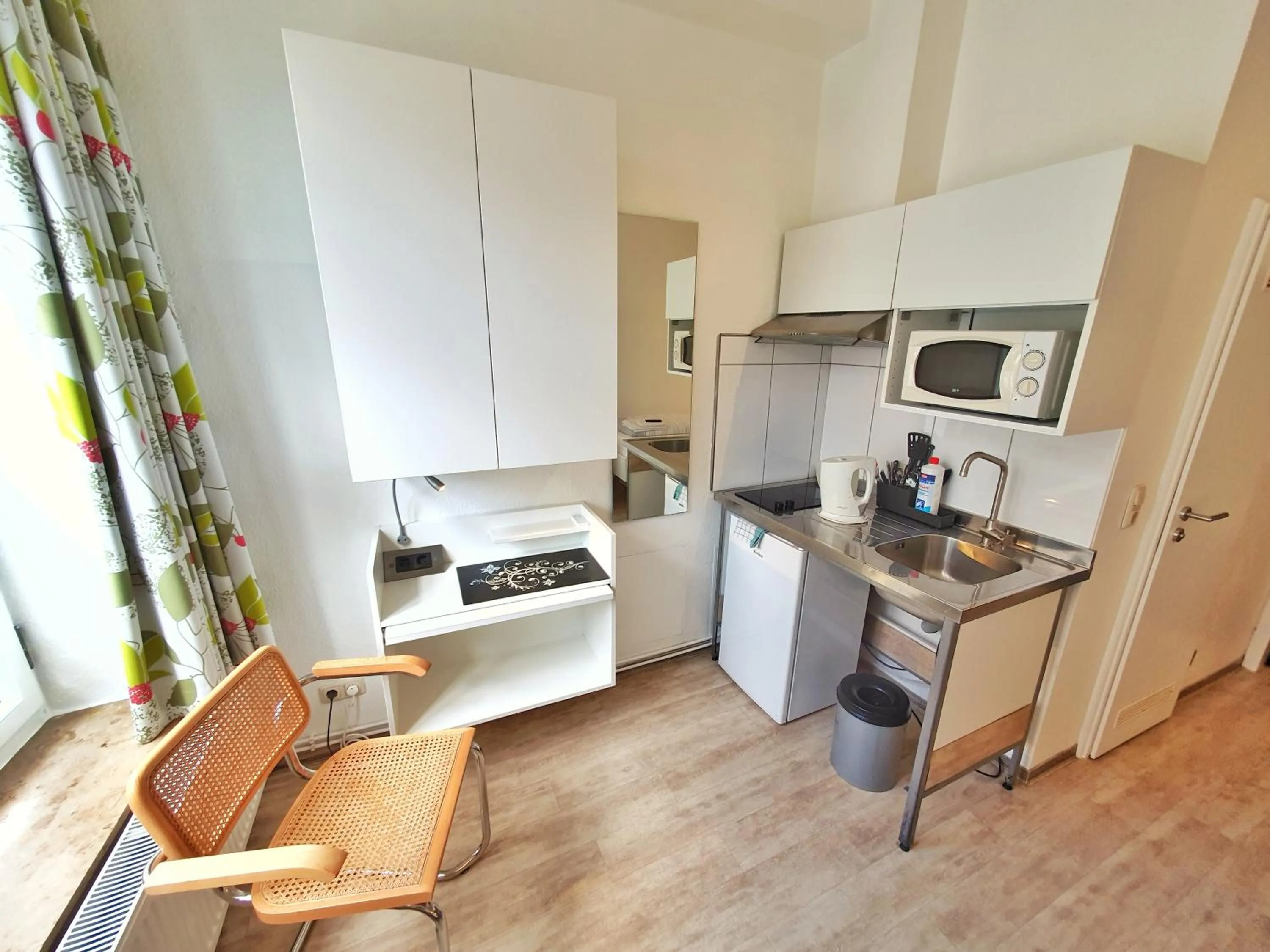 Kitchen or kitchenette in Aparthotel B & L