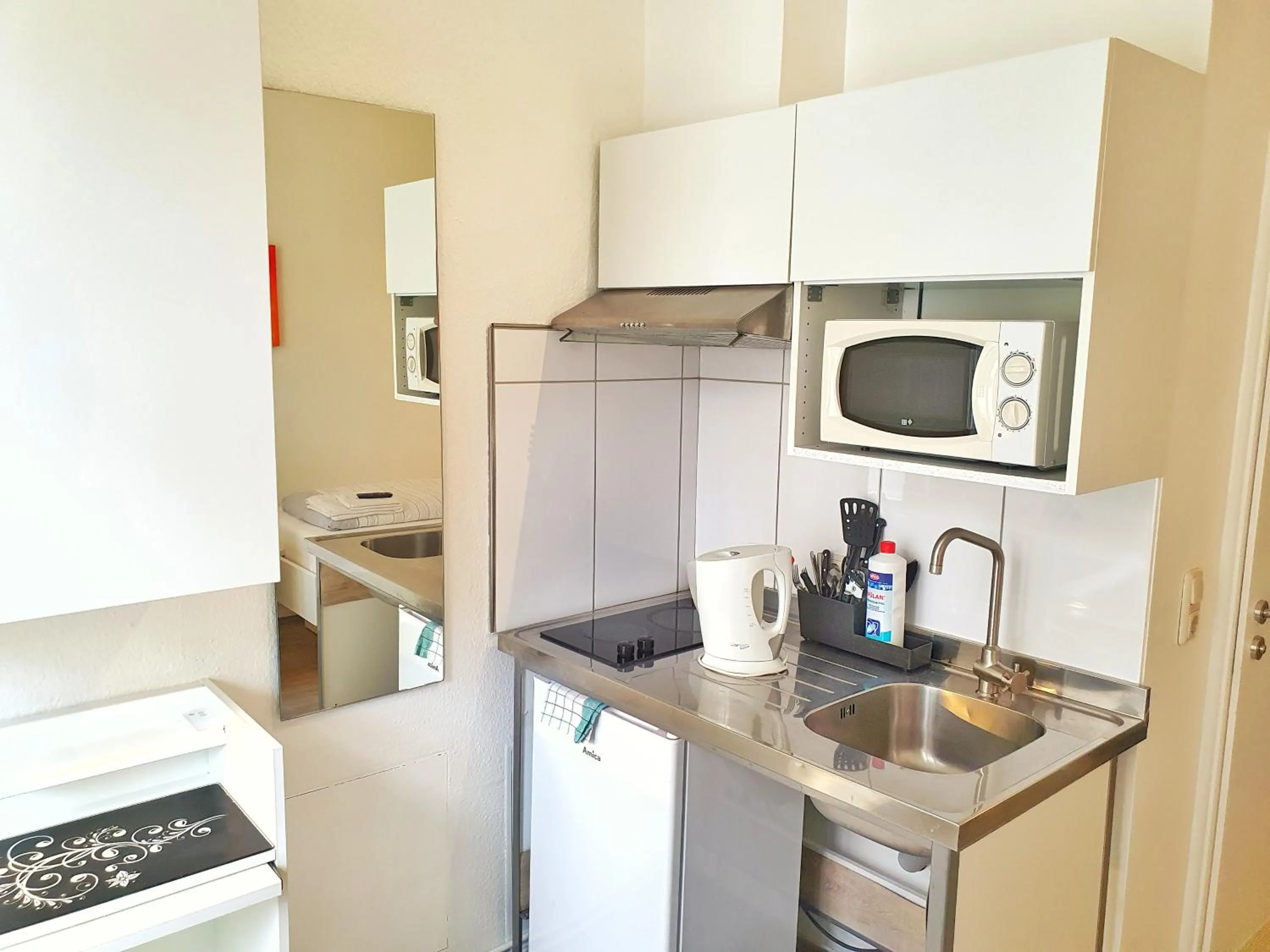 Kitchen or kitchenette in Aparthotel B & L