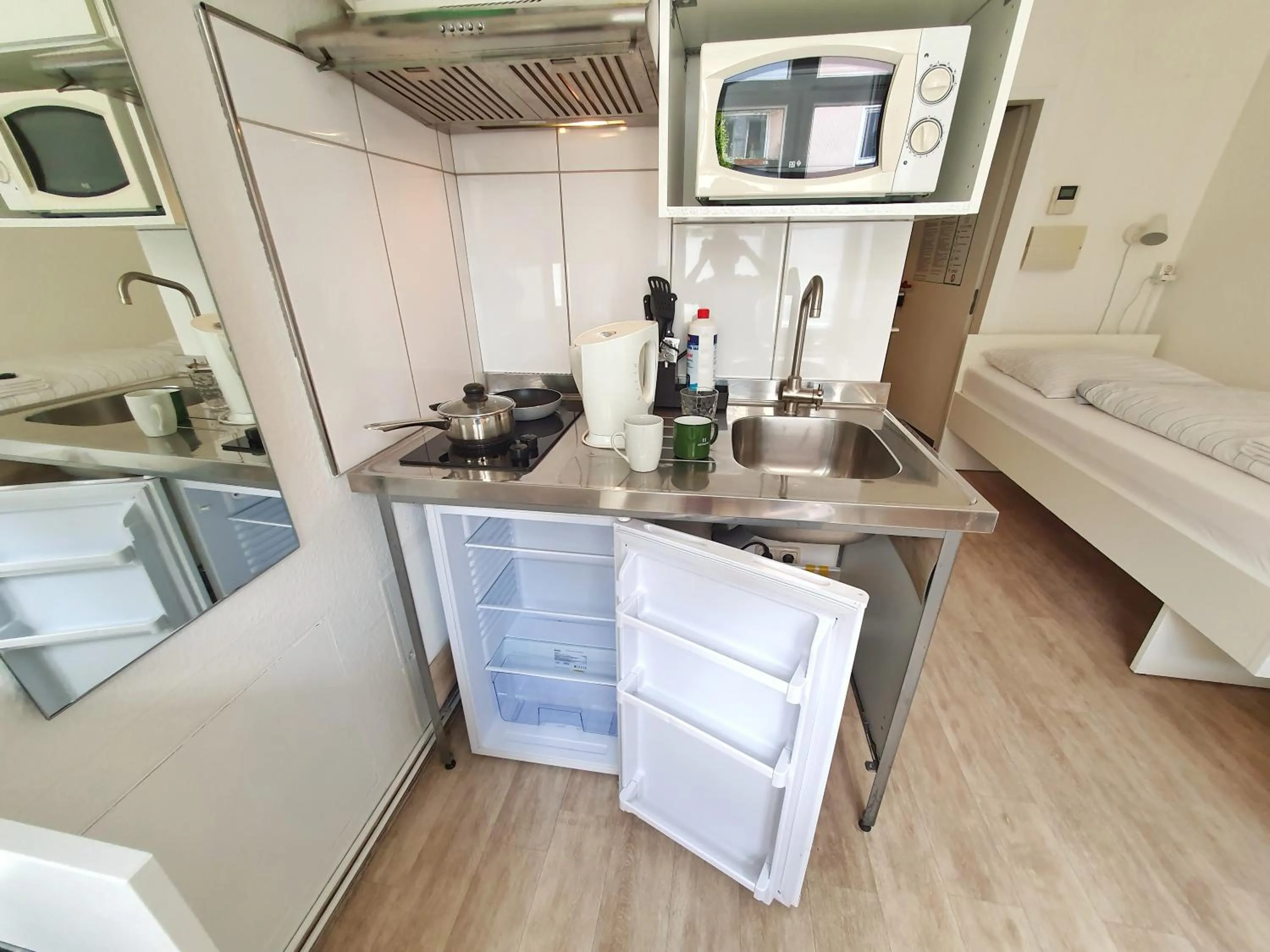Kitchen or kitchenette in Aparthotel B & L