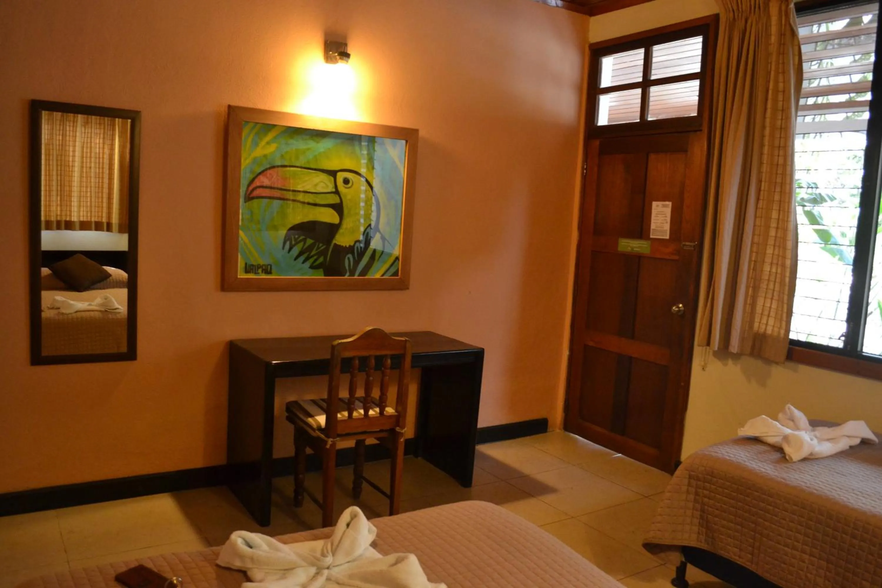 Decorative detail, Bed in Hotel Jaguar Inn Tikal