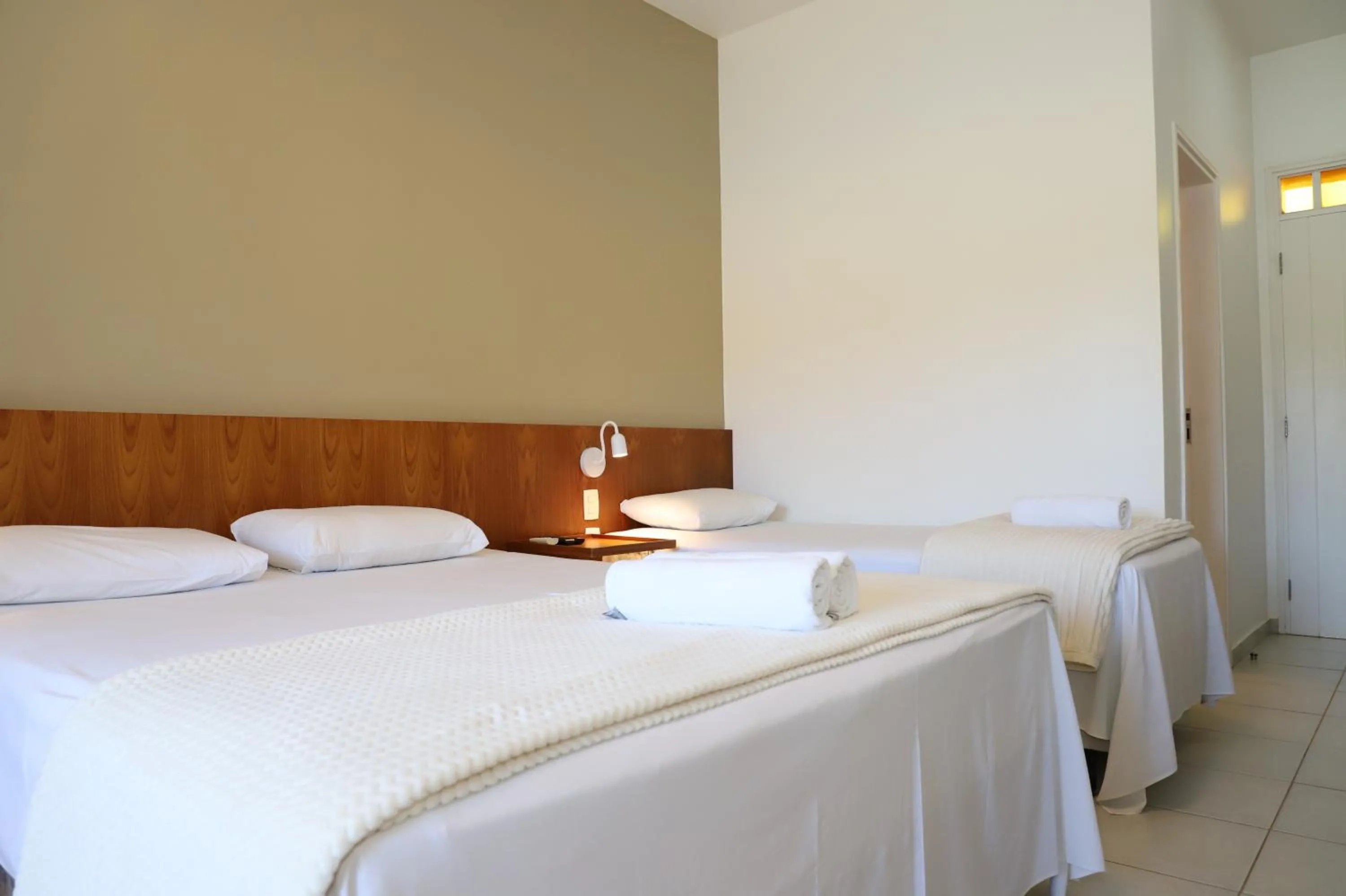 Bed in Engenho da Serra Hotel EcoResort