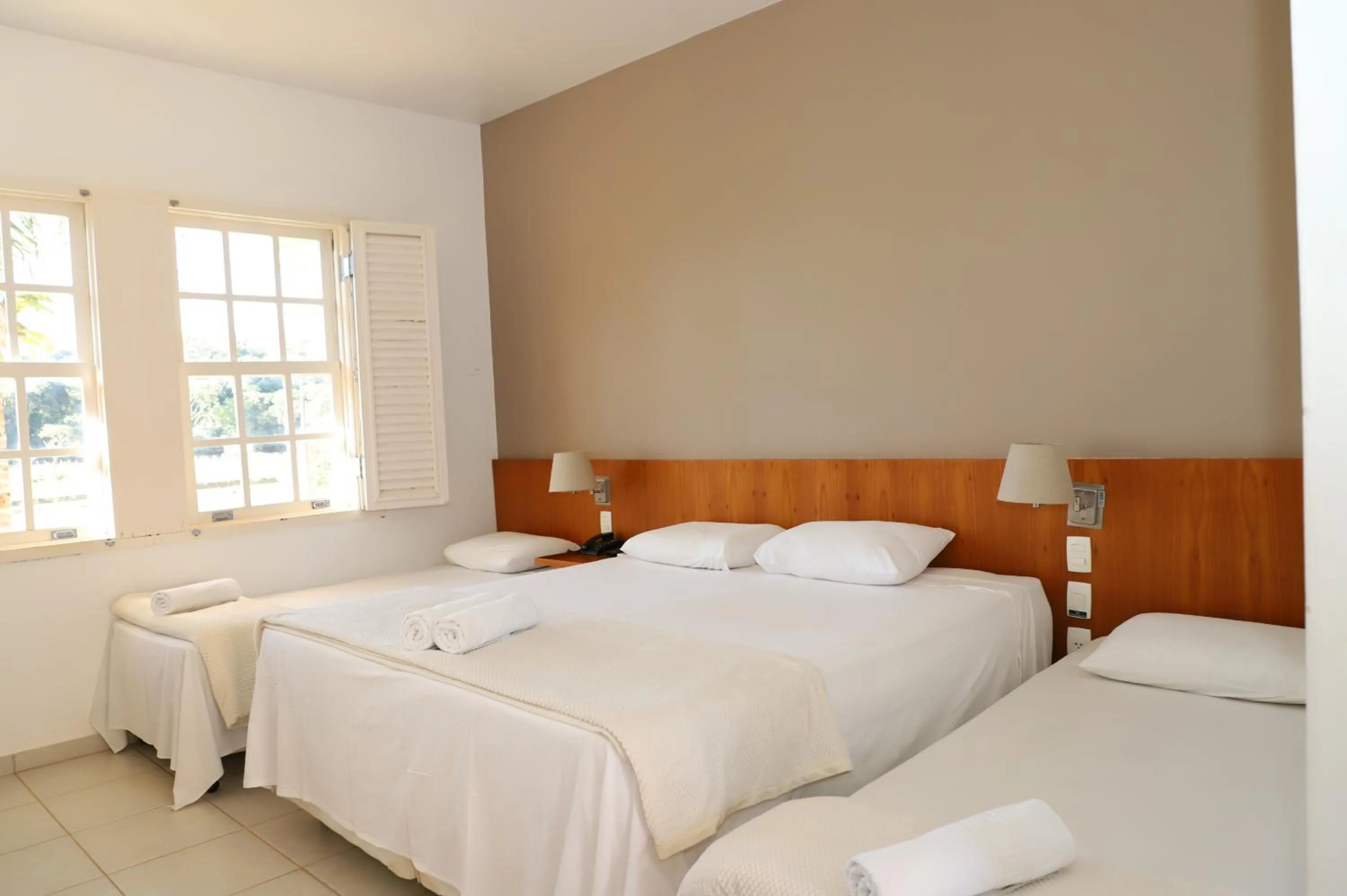 Bed in Engenho da Serra Hotel EcoResort