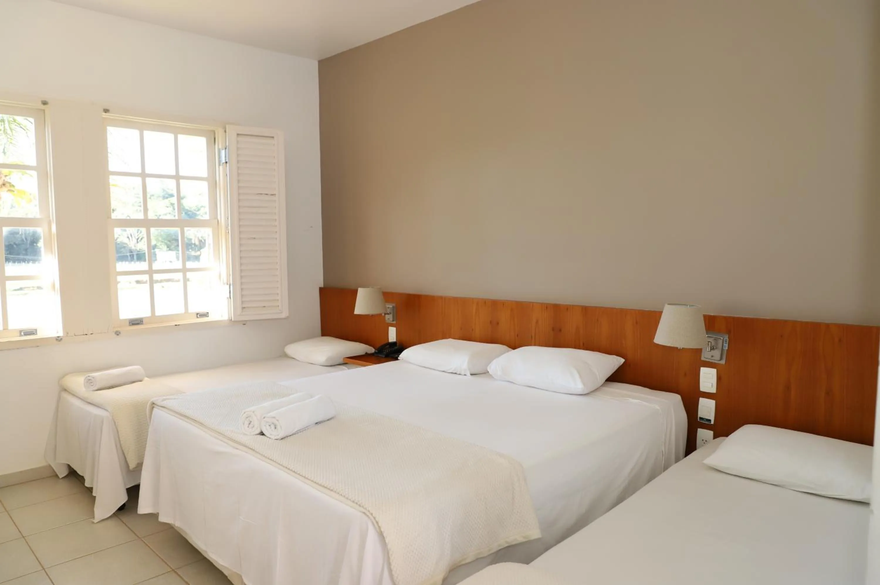 Bed in Engenho da Serra Hotel EcoResort