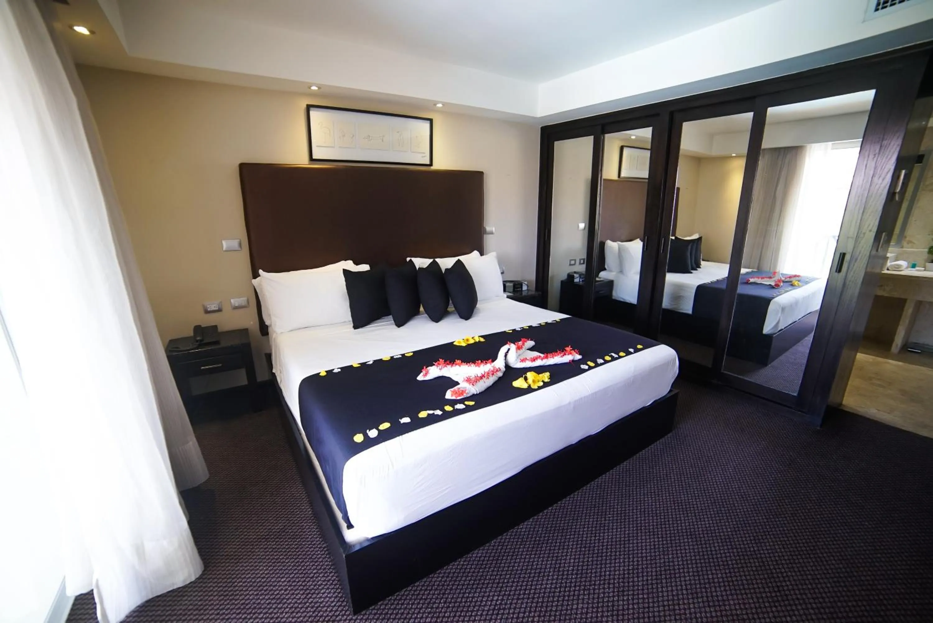 Bed in Savoy Hotel Boutique