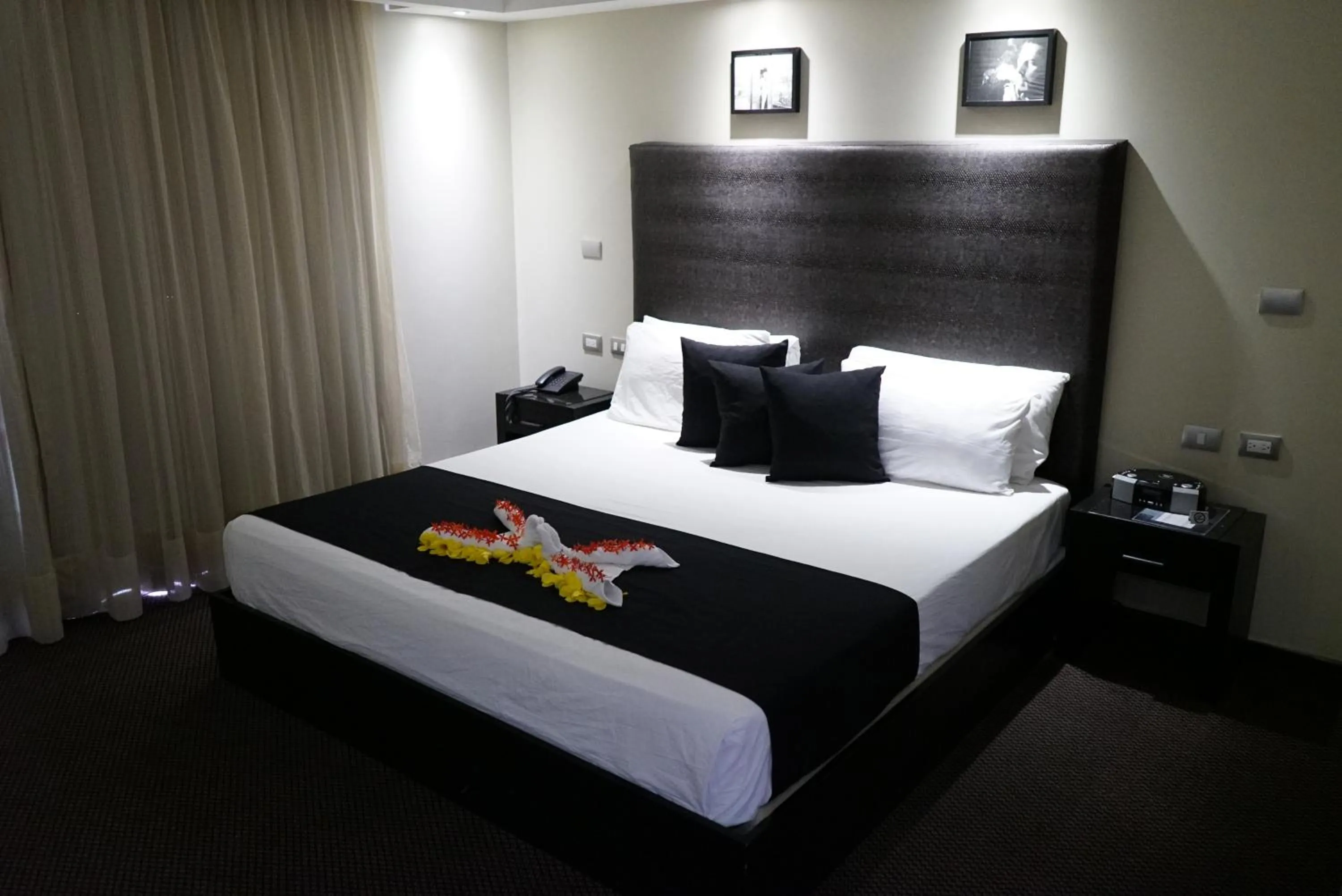 Bed in Savoy Hotel Boutique