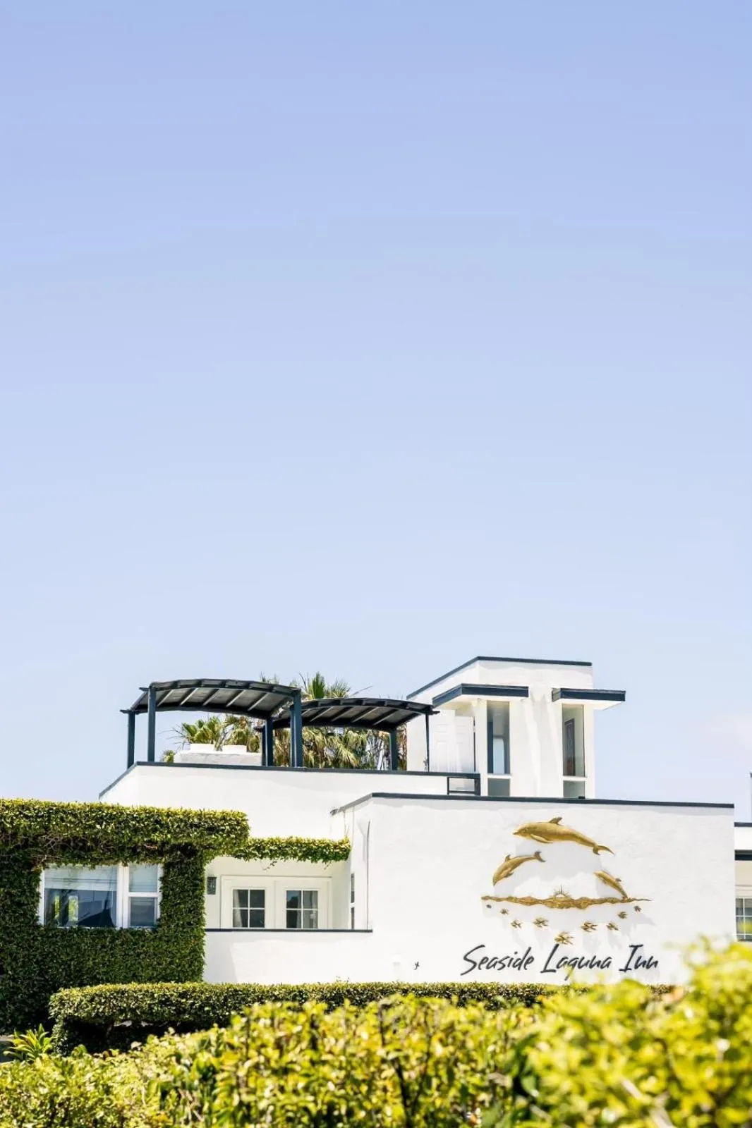 Property logo or sign in Seaside Laguna Inn & Suites