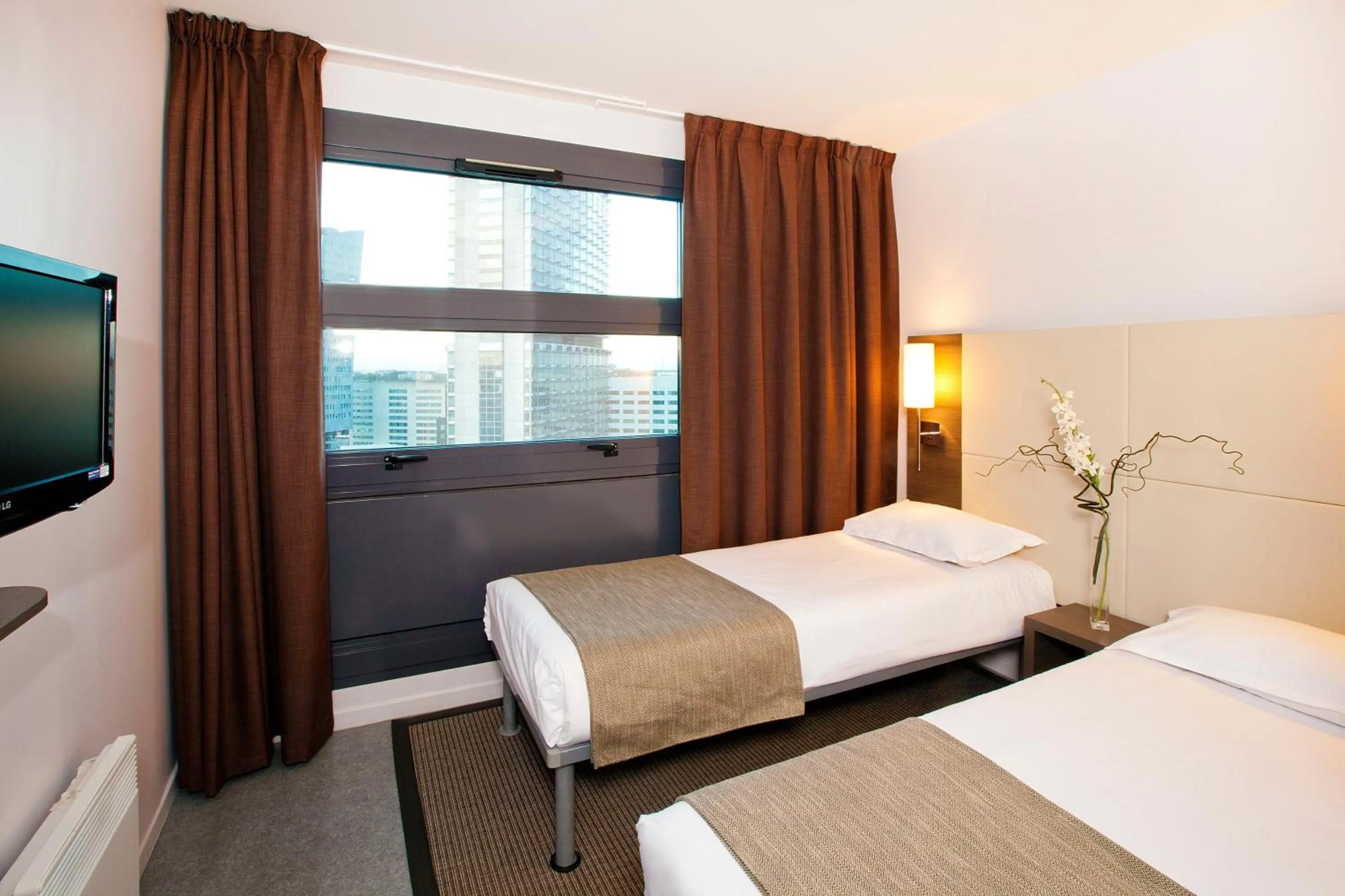 Bedroom, Bed in Séjours & Affaires Lille Europe