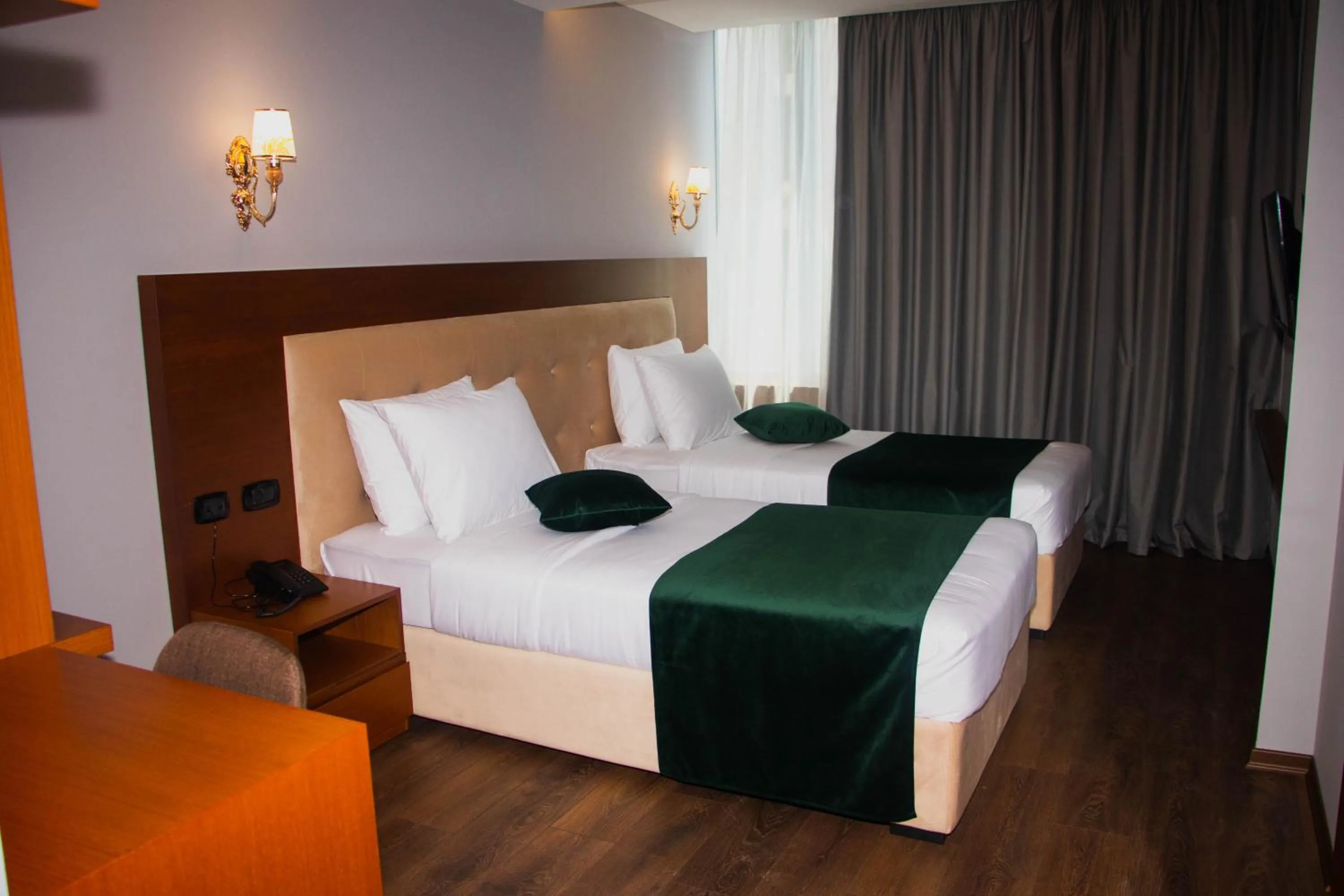 Bed in Albanopolis Hotel