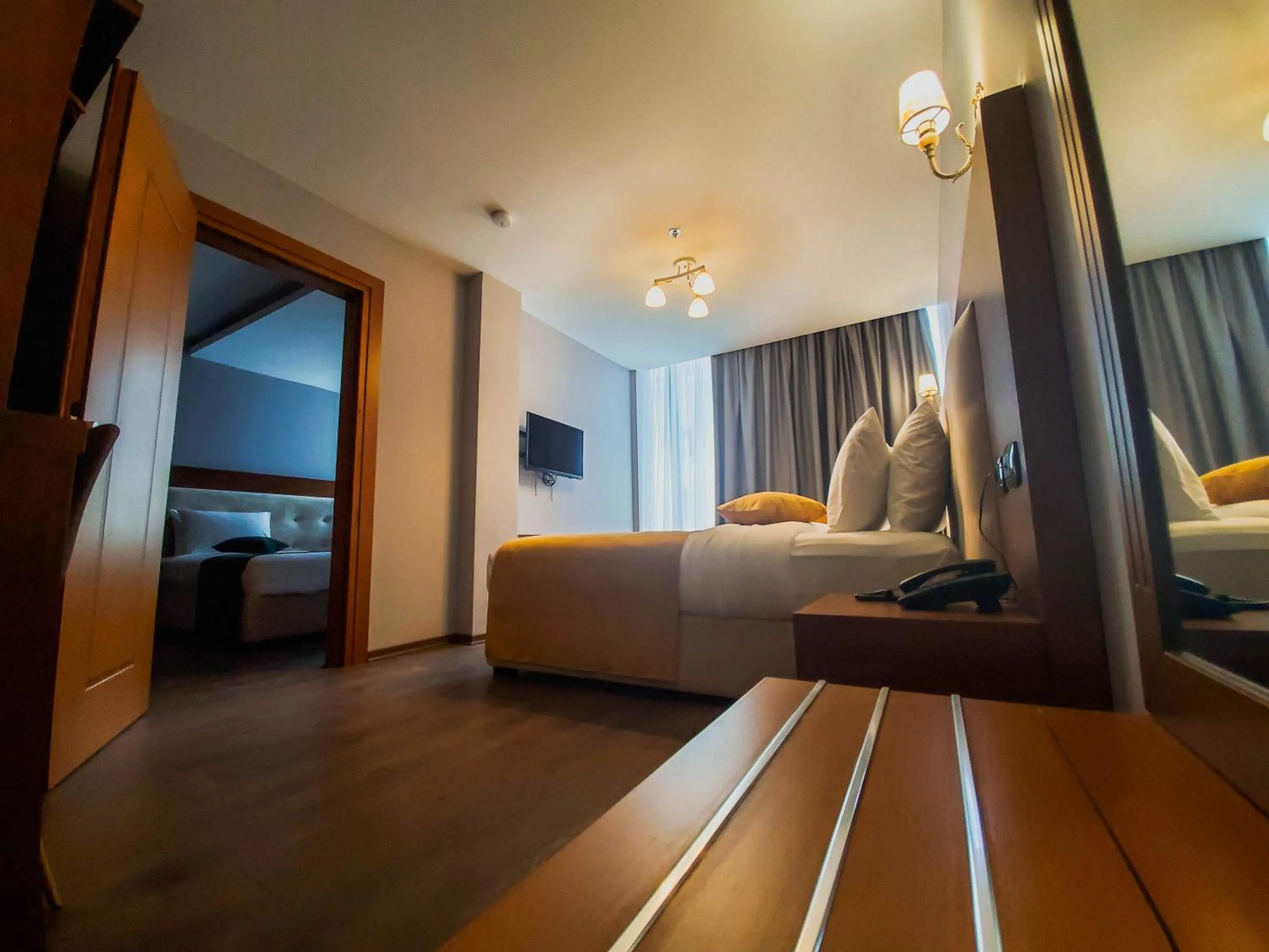 Bed in Albanopolis Hotel