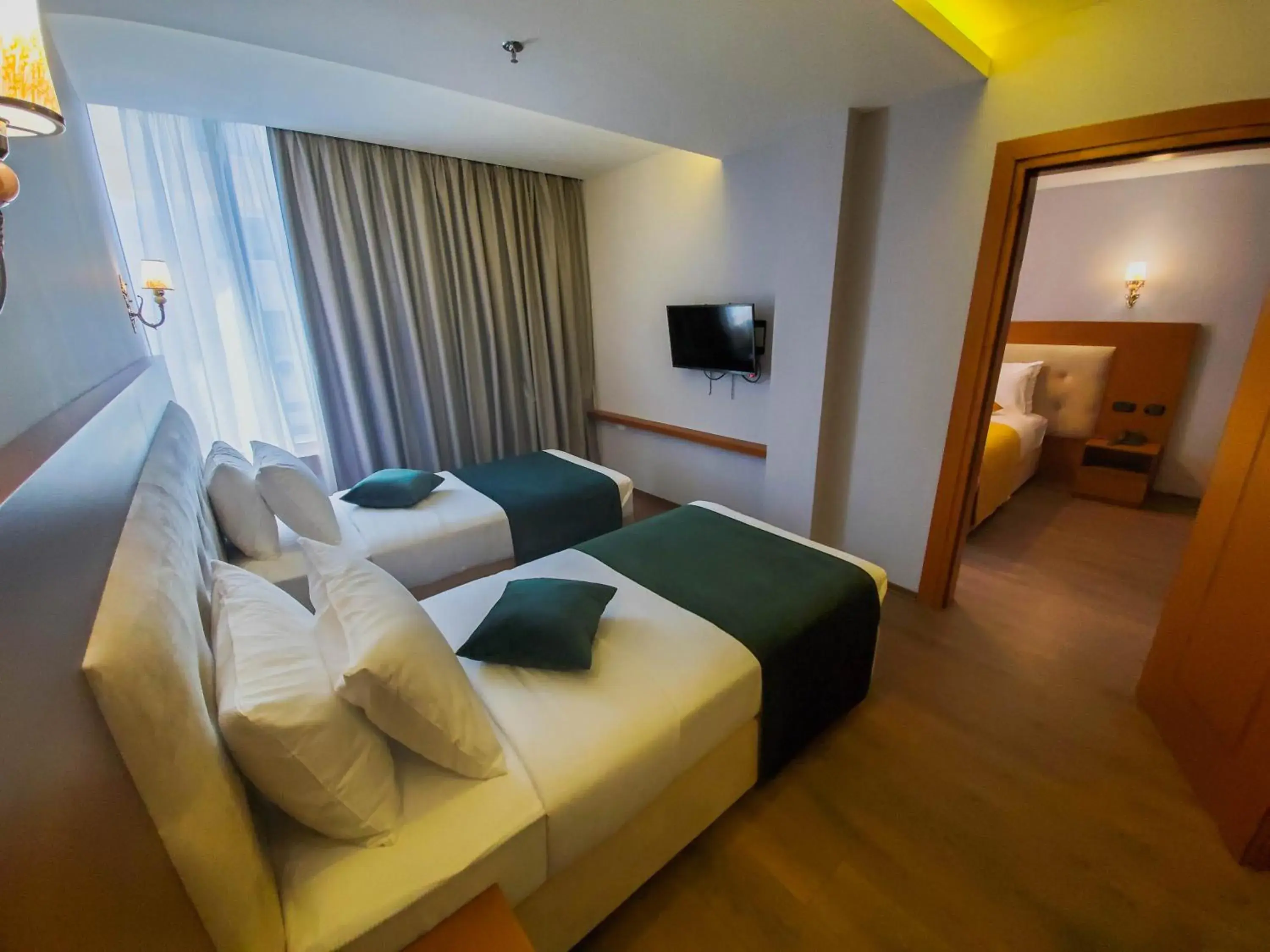 Family Room with Private Bathroom in Albanopolis Hotel Family Room with Private Bathroom in Albanopolis Hotel