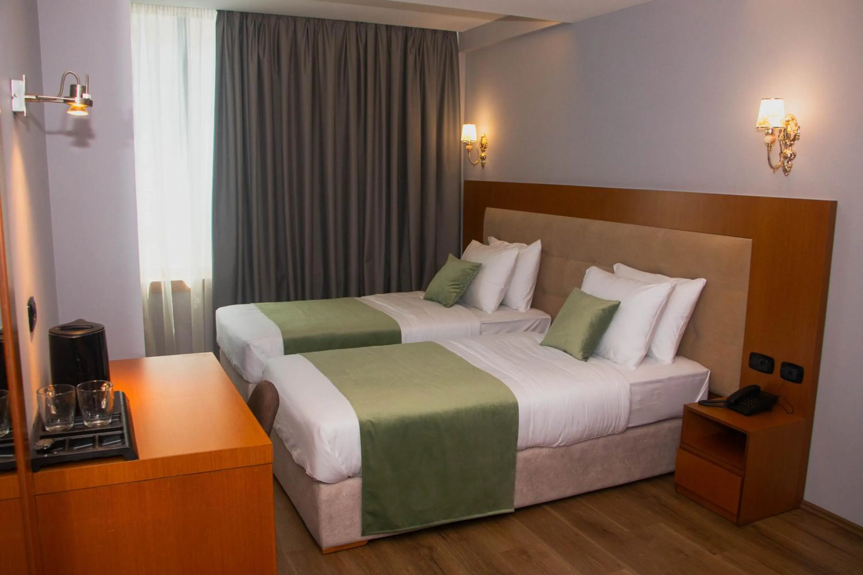 Bed in Albanopolis Hotel
