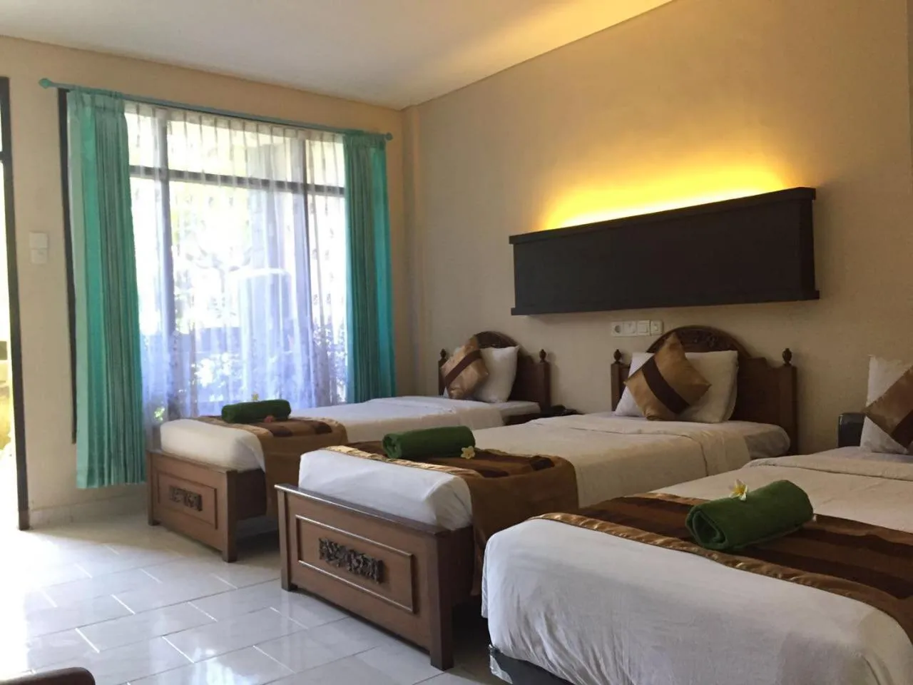 Bed in Bakung Beach Resort