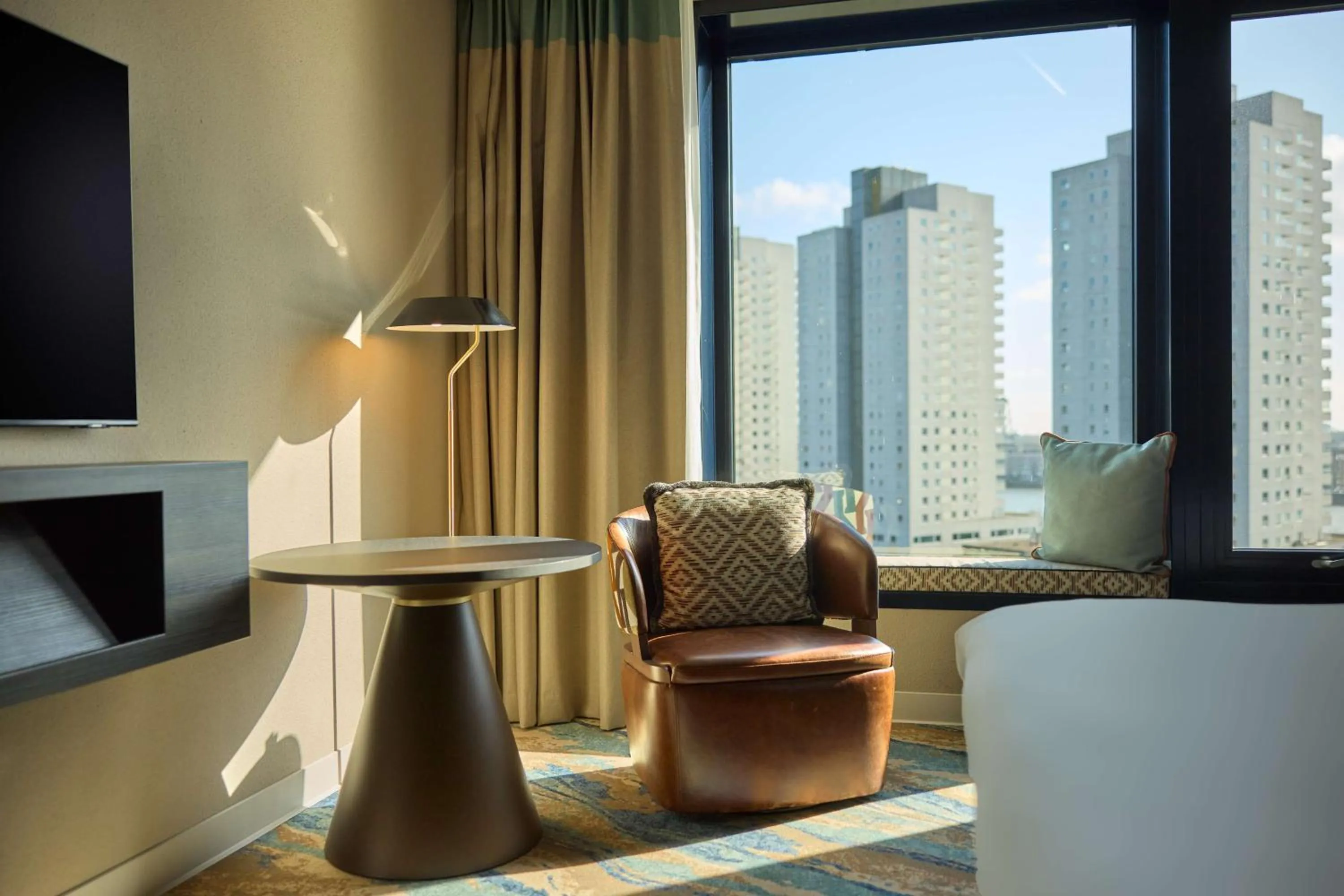 Living room in Haven Hotel Rotterdam, Curio Collection by Hilton