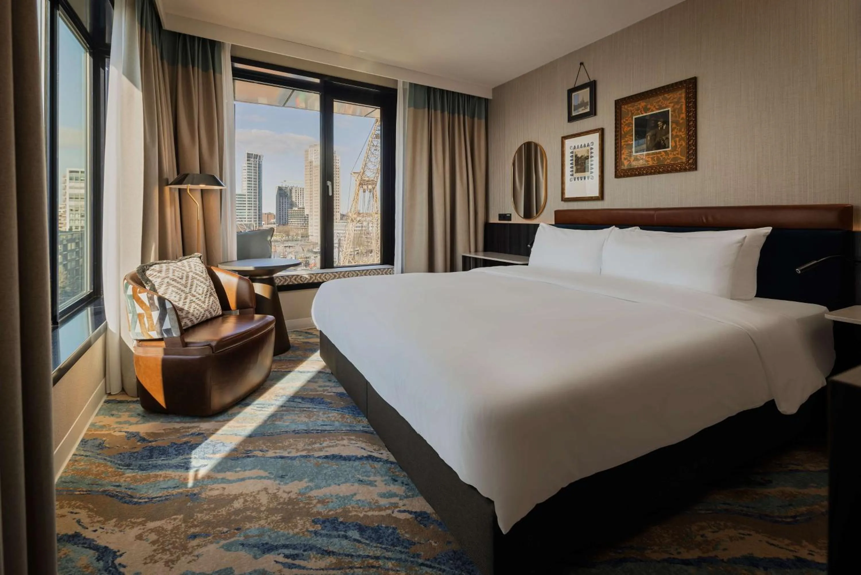 Living room, Bed in Haven Hotel Rotterdam, Curio Collection by Hilton