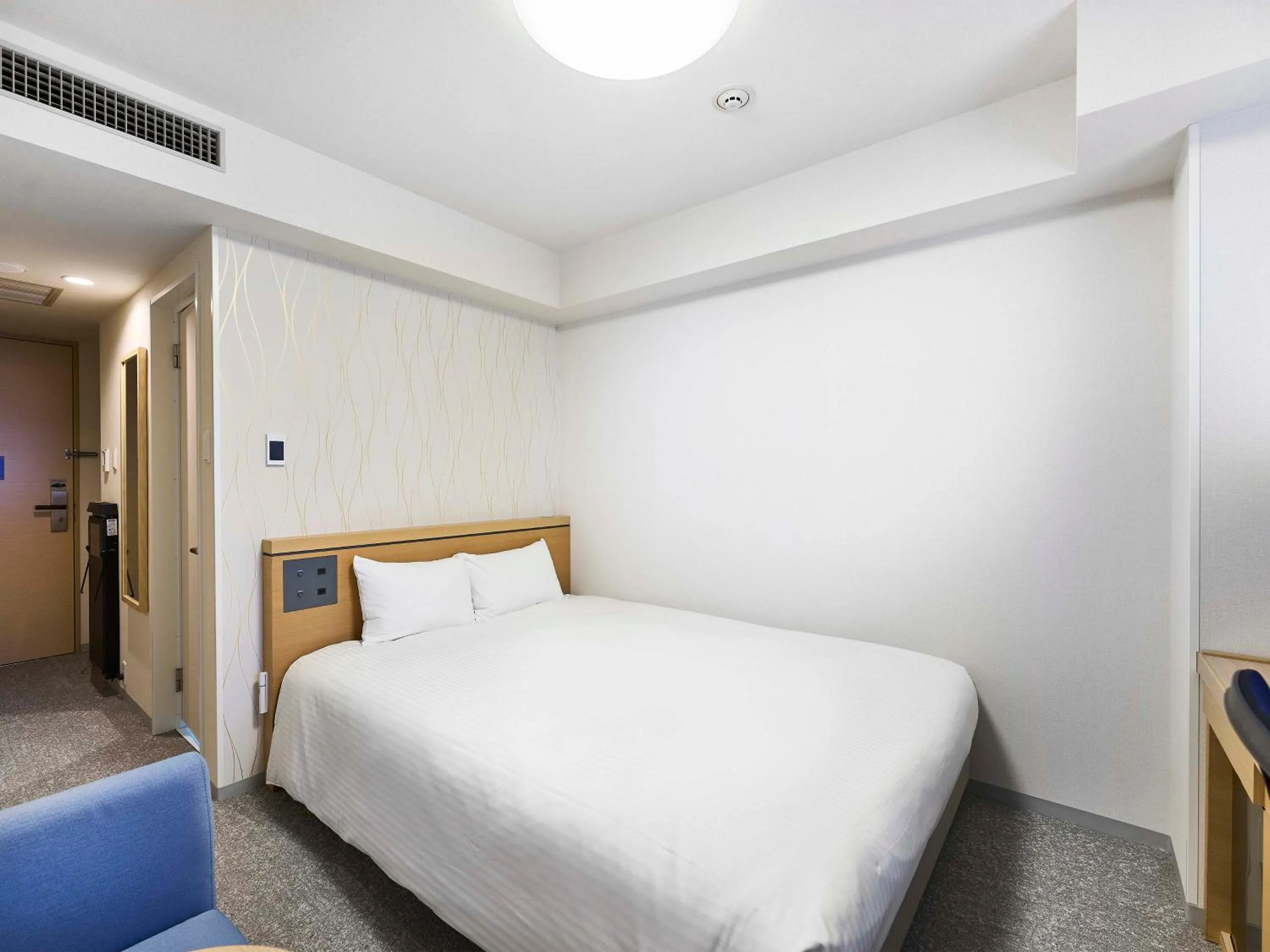 Bed in Daiwa Roynet Hotel Naha Kokusaidori