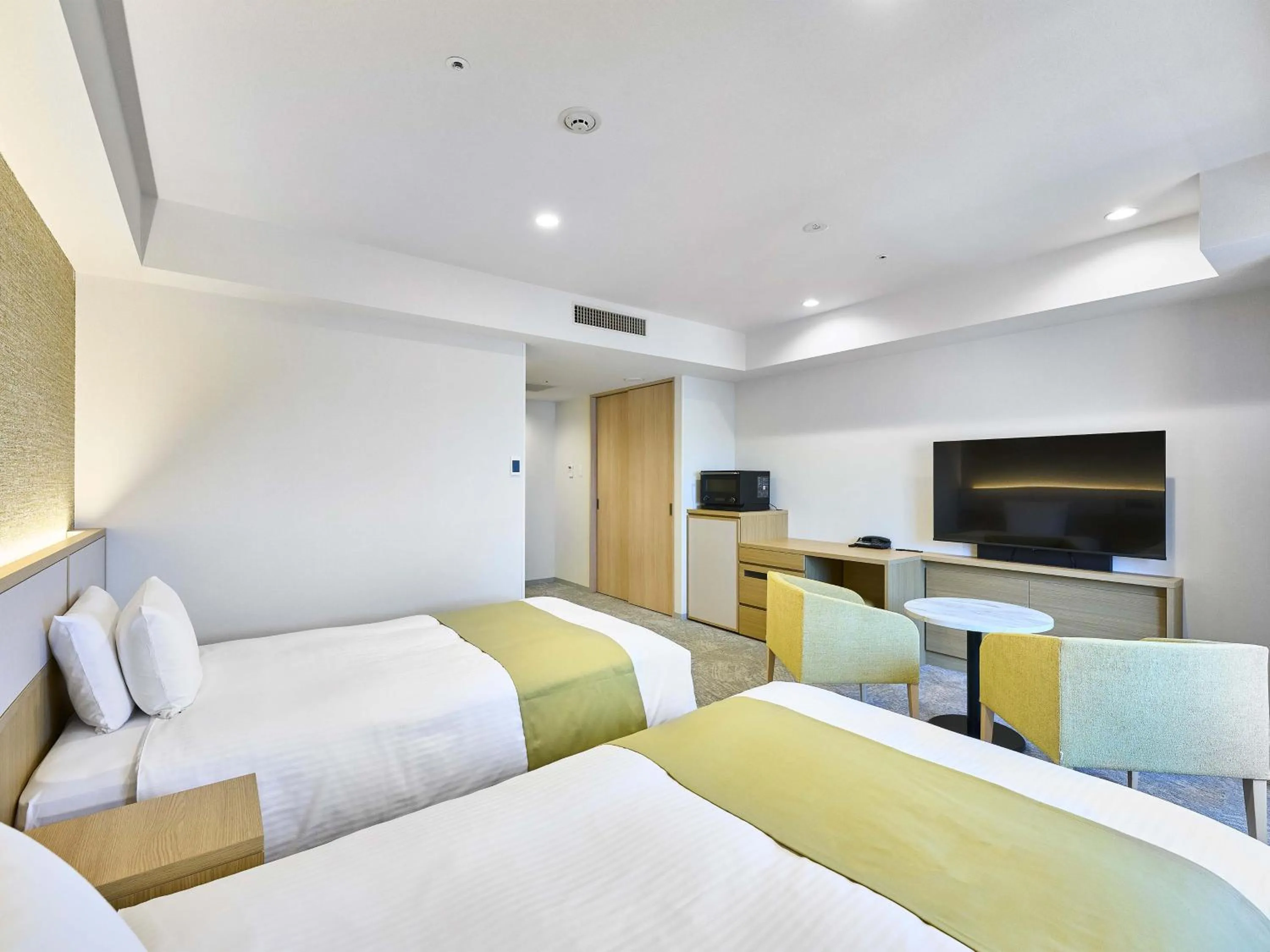 Bed in Daiwa Roynet Hotel Naha Kokusaidori