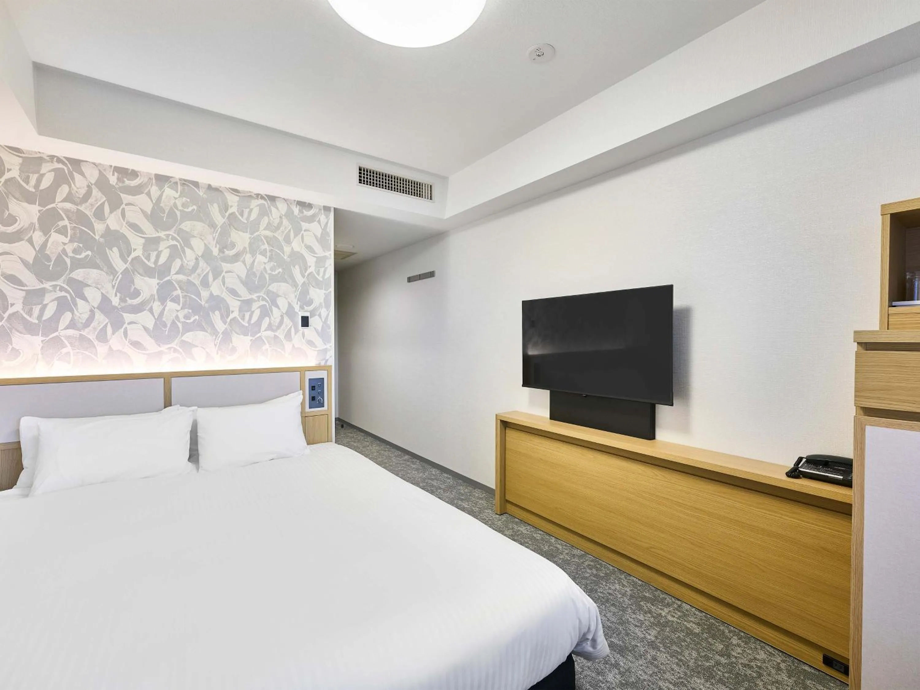 Bed in Daiwa Roynet Hotel Naha Kokusaidori