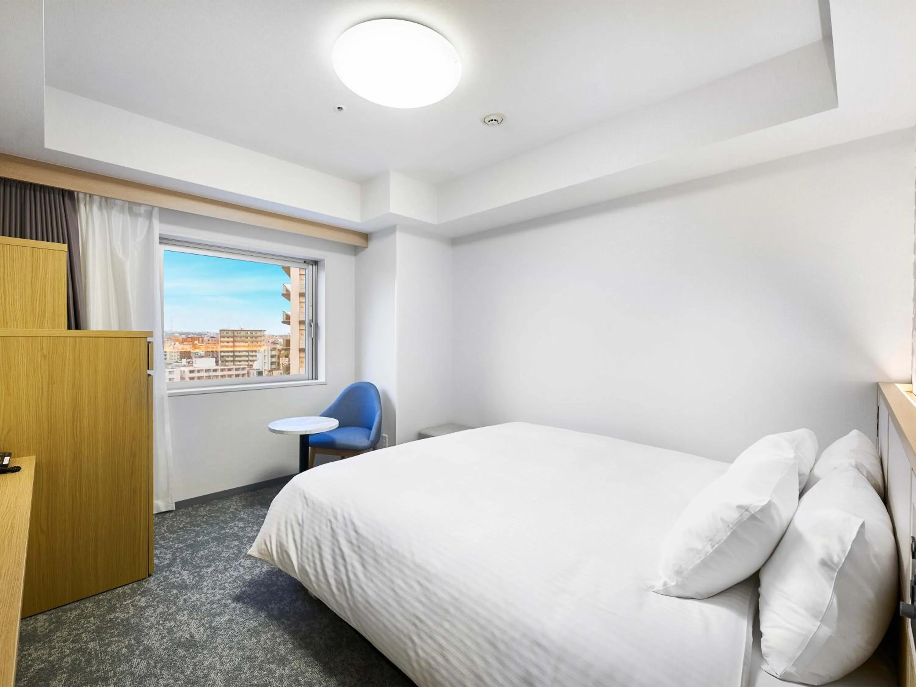 Bed in Daiwa Roynet Hotel Naha Kokusaidori