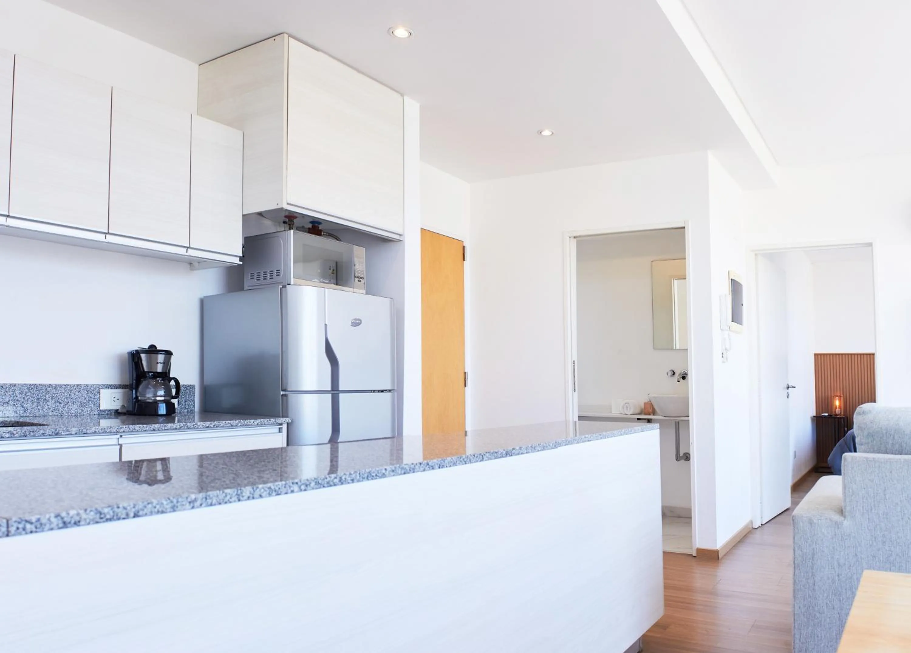 Kitchen or kitchenette in Monroe Suites