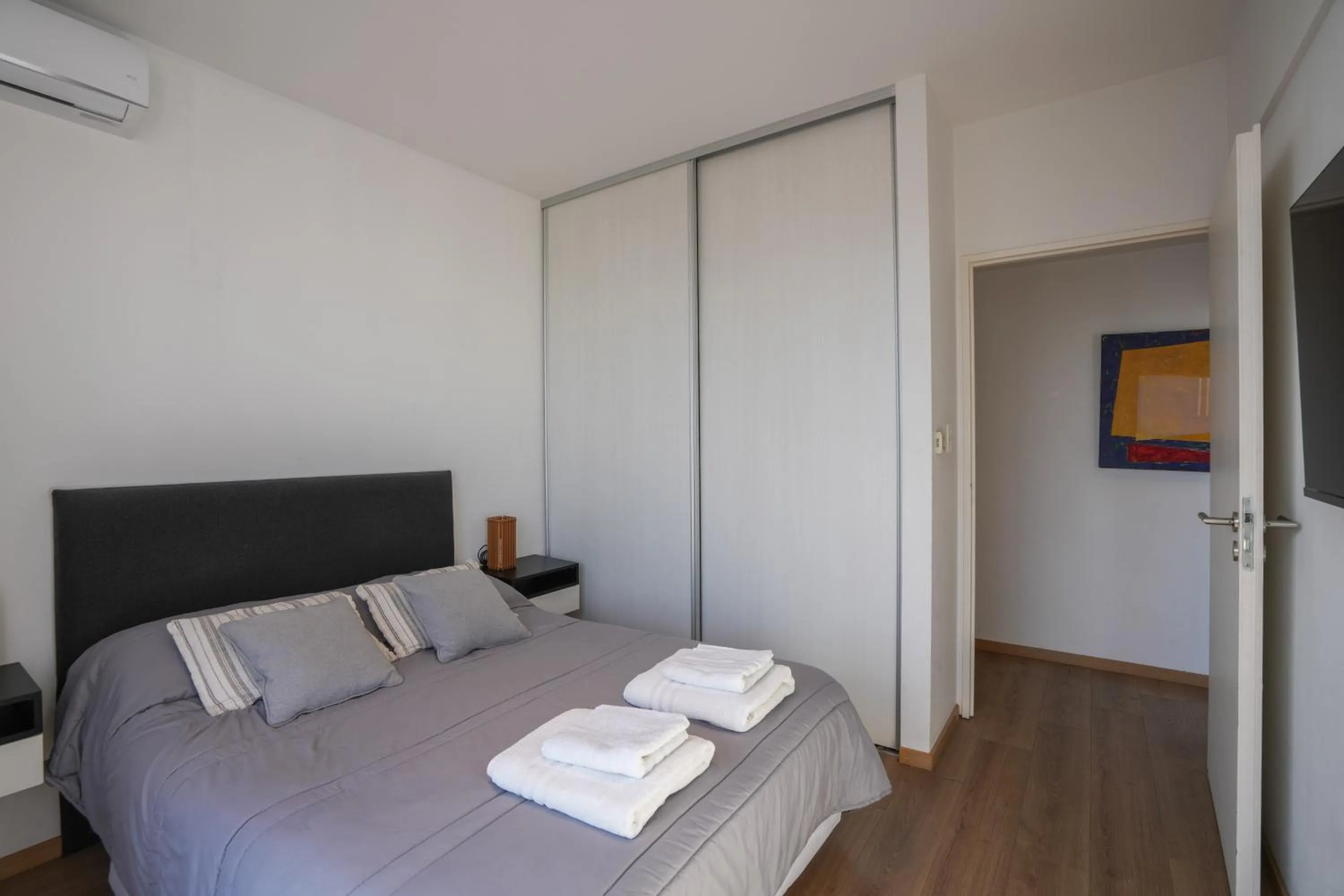 Bed in Monroe Suites