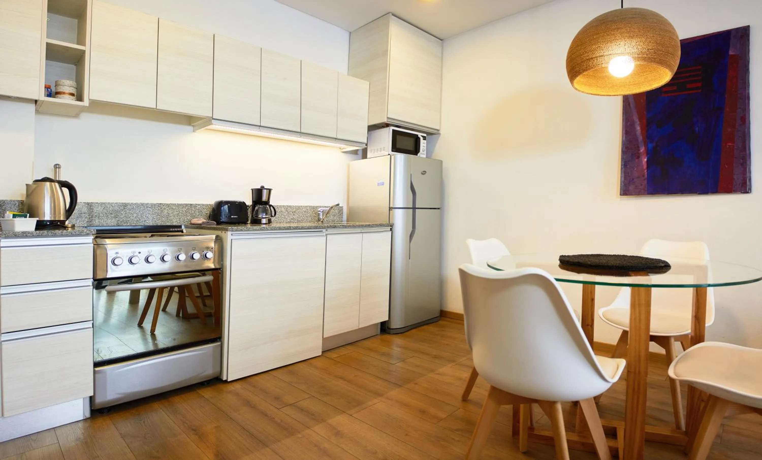 Kitchen or kitchenette in Monroe Suites