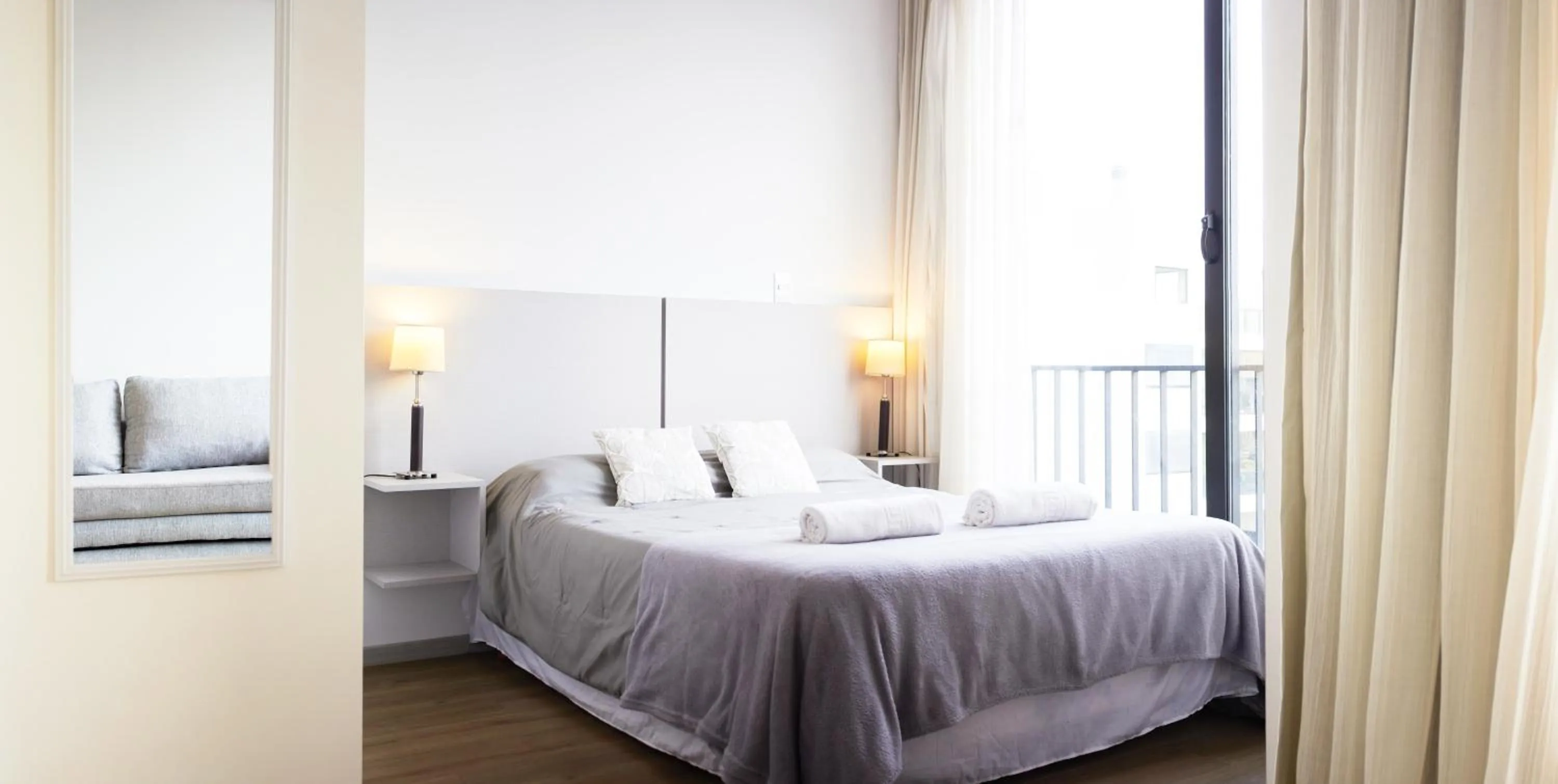 Bed in Monroe Suites