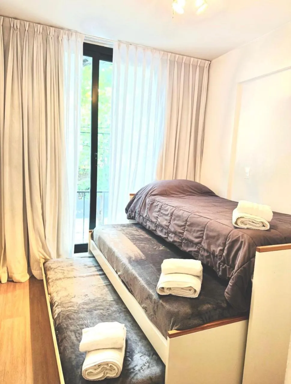 Bed in Monroe Suites