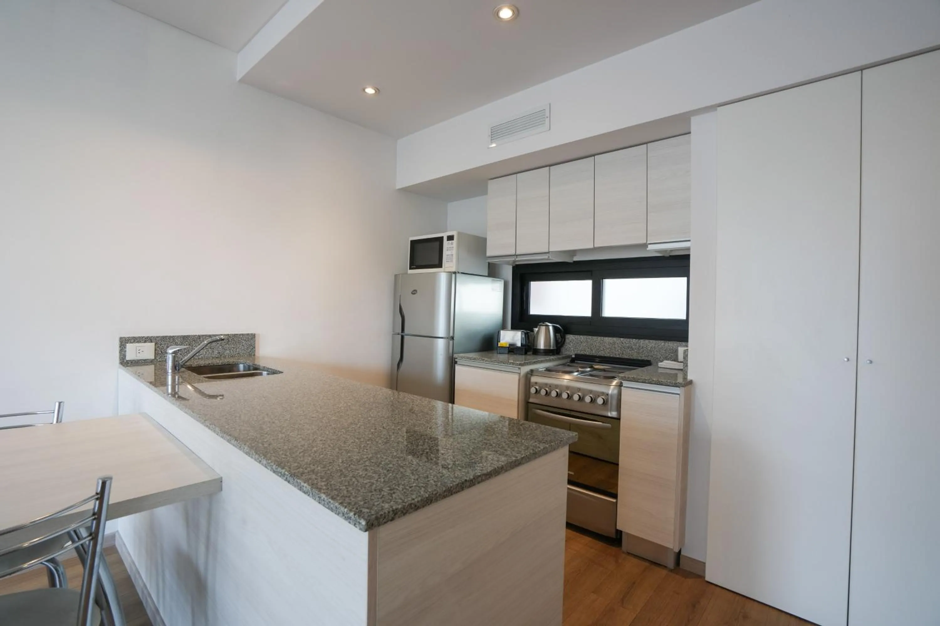 kitchen in Monroe Suites