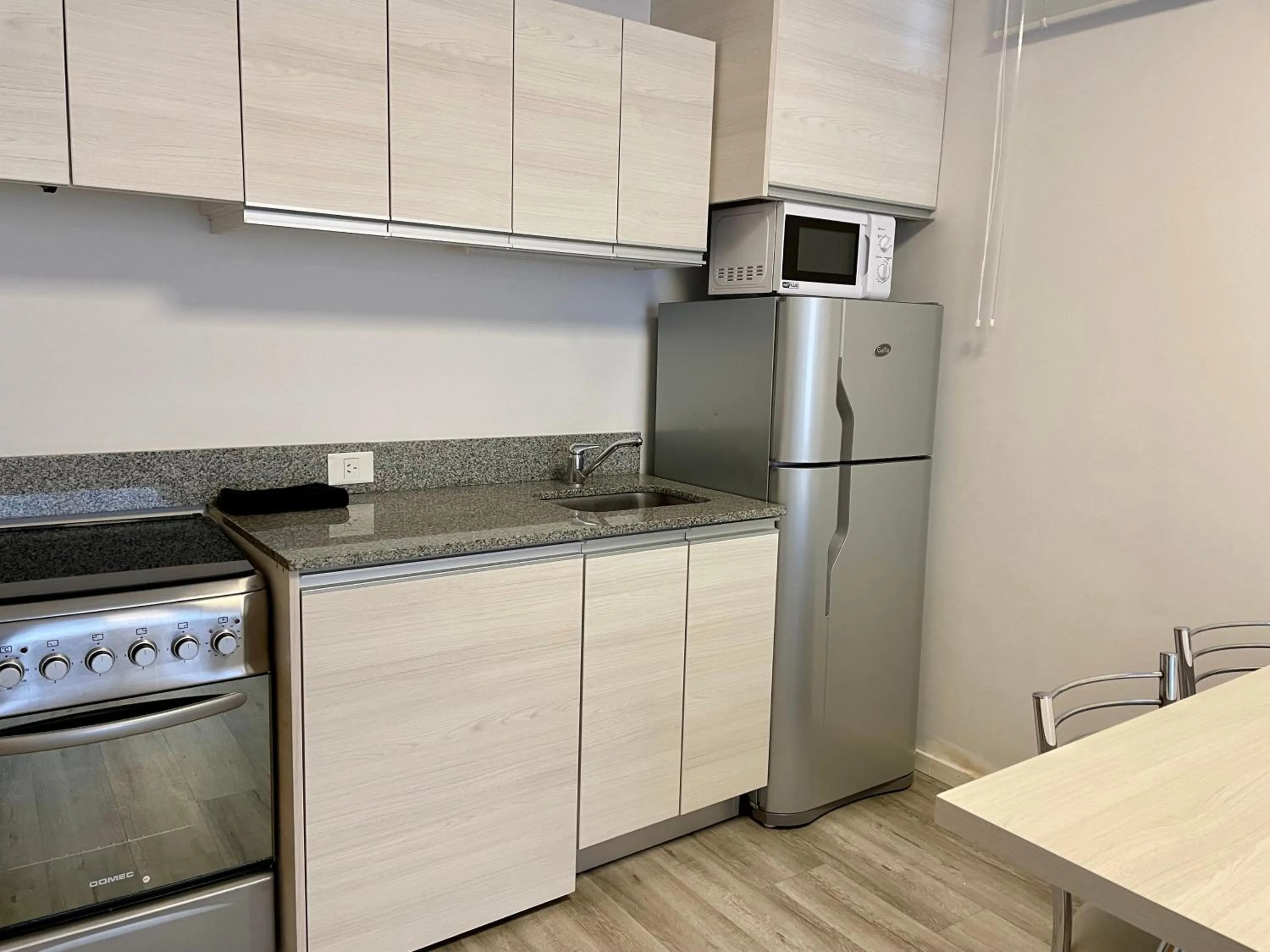 Kitchen or kitchenette in Monroe Suites