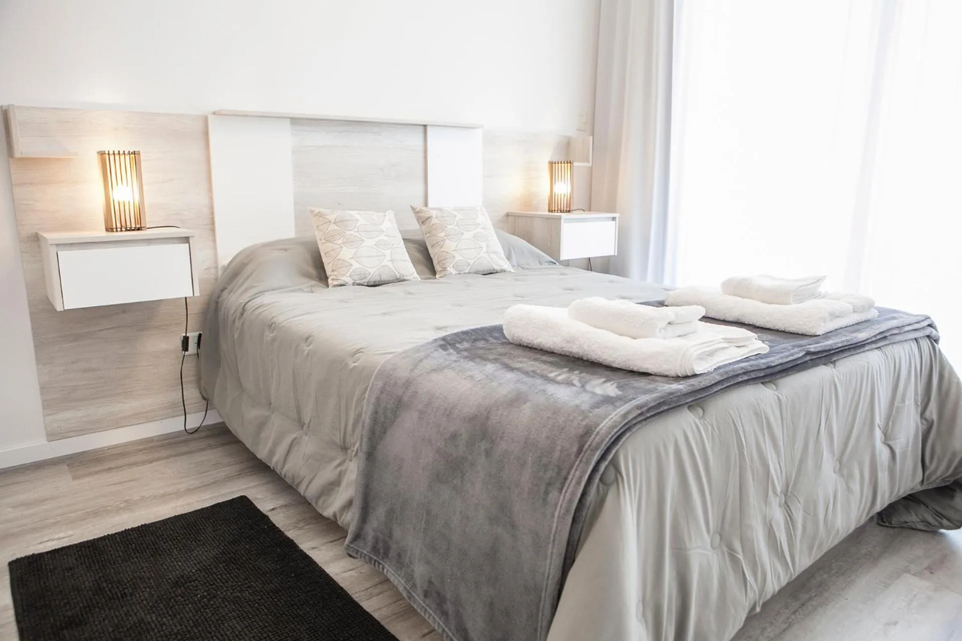 Bed in Monroe Suites