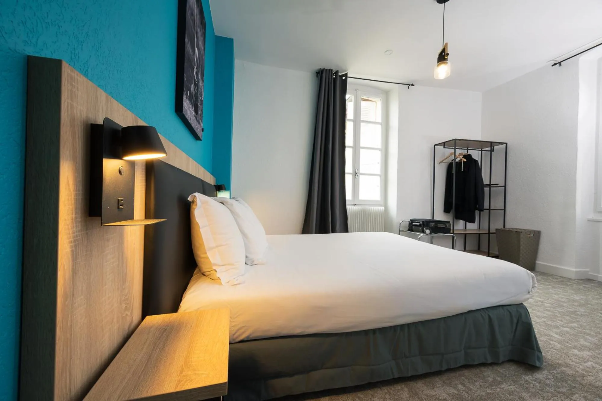 Bed in Hôtel de France - Le Patriarche