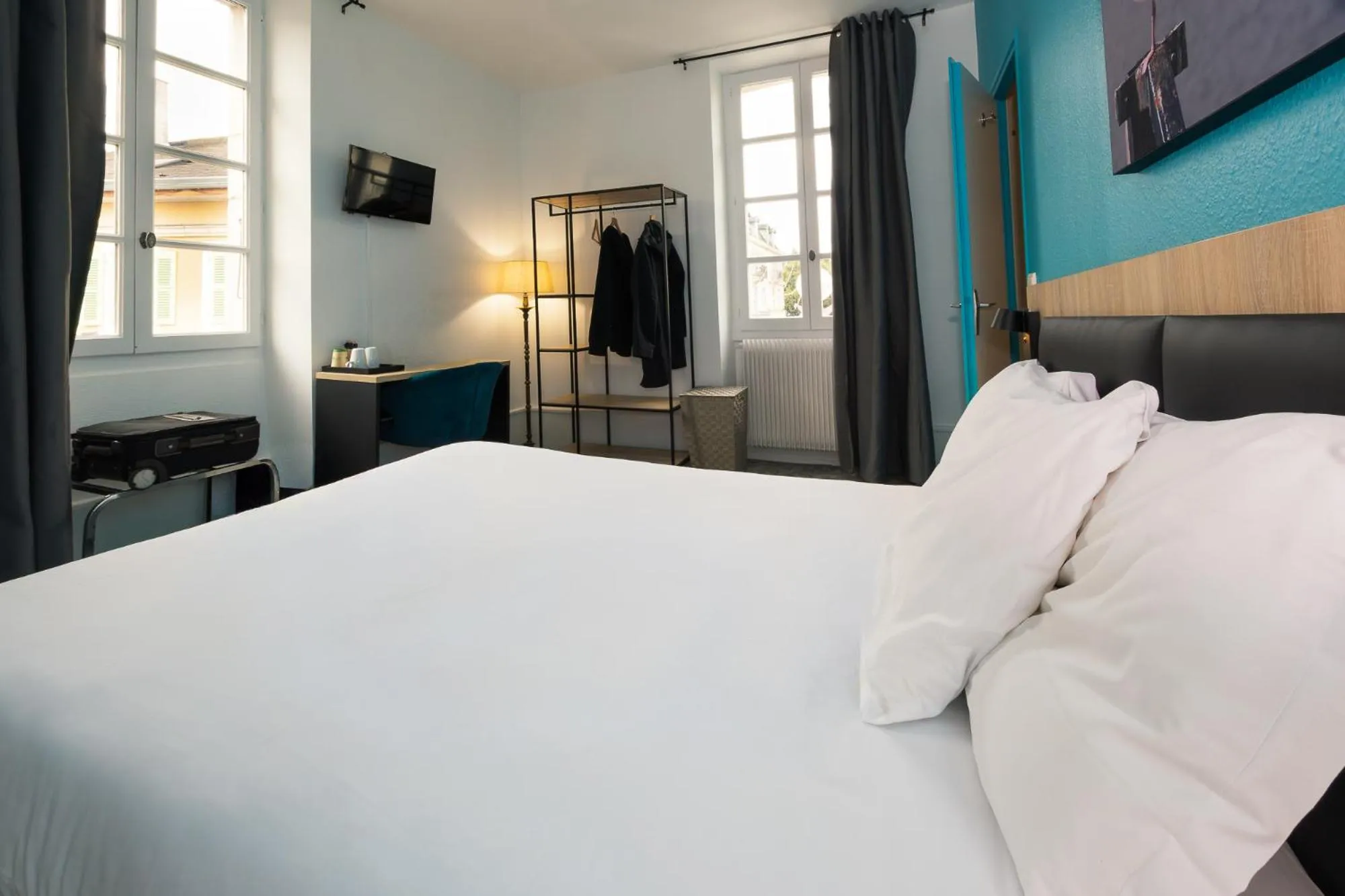 Bed in Hôtel de France - Le Patriarche