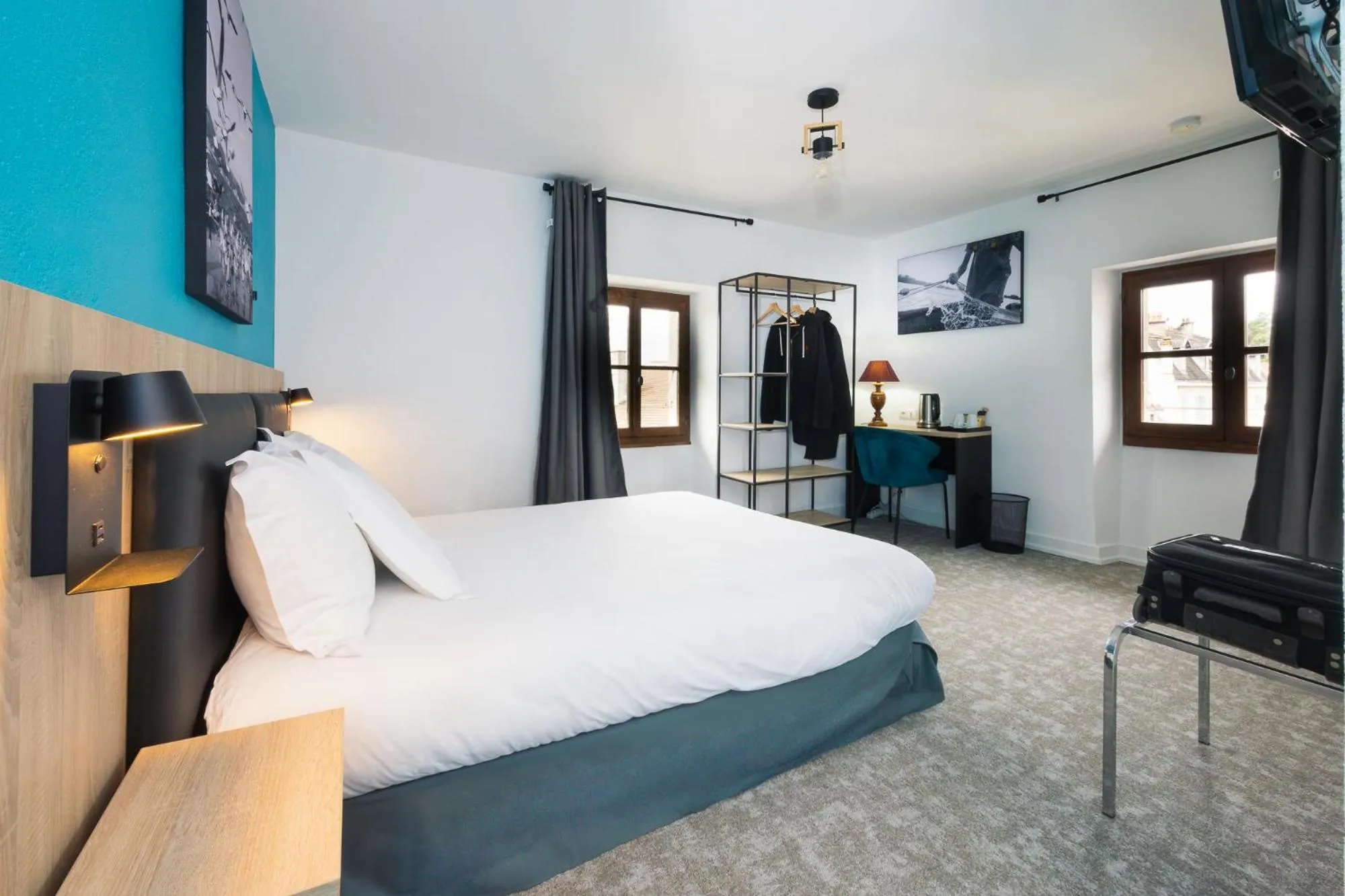 Bed in Hôtel de France - Le Patriarche