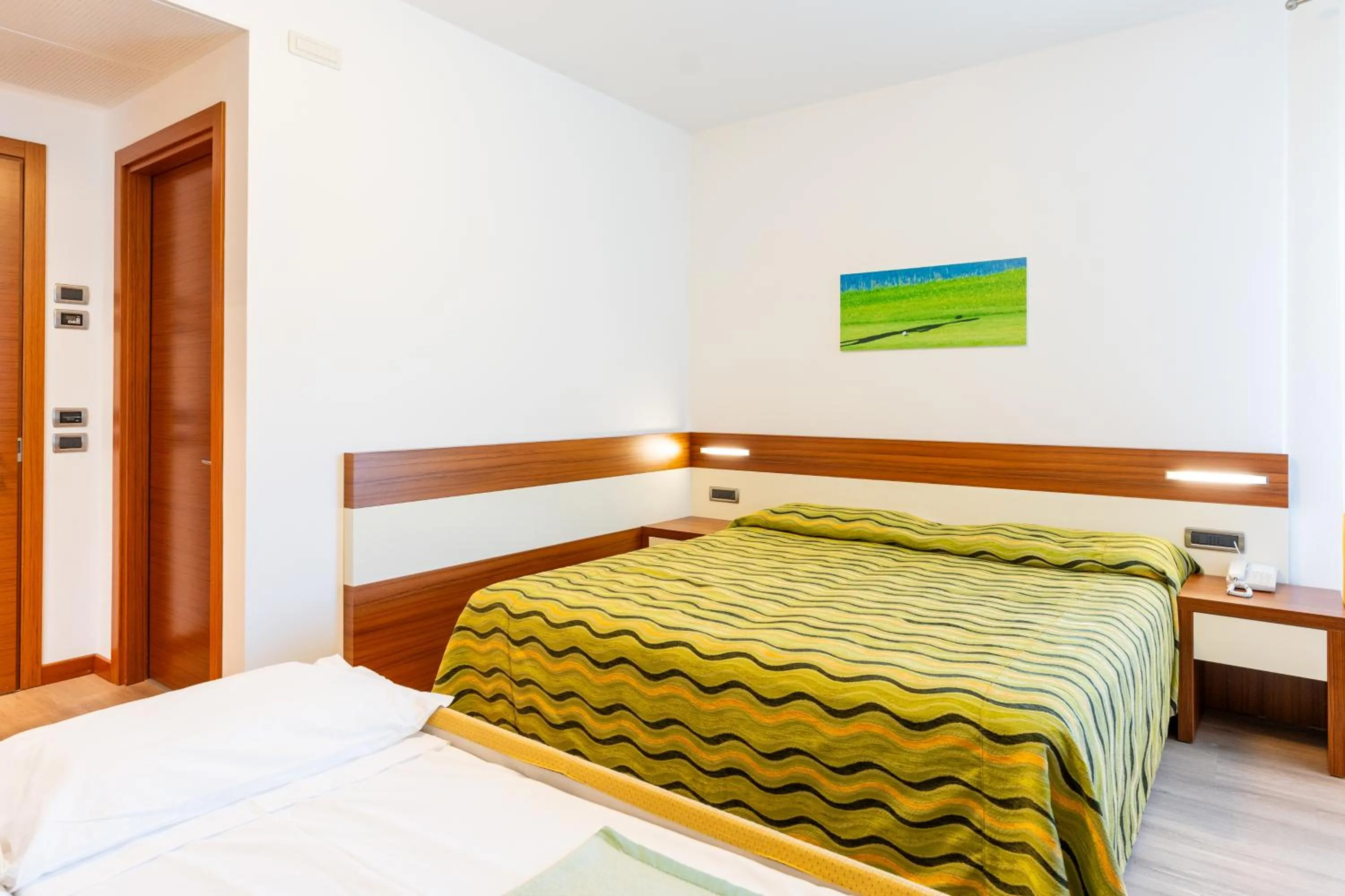 Bed in Hotel Maregolf