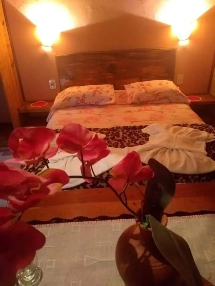 Bed in Pousada ao nascer do sol