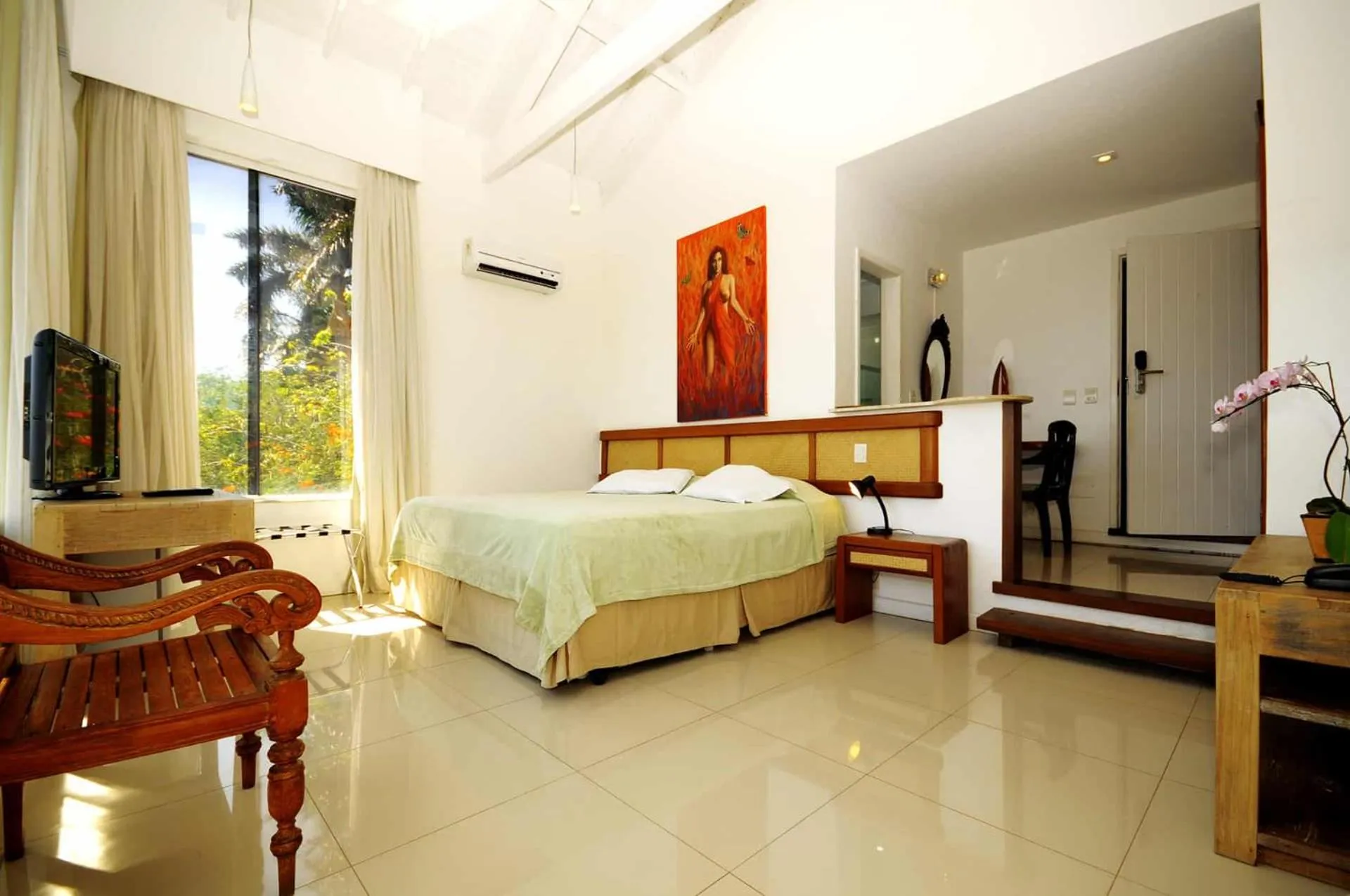 Photo of the whole room, Bed in Pousada Pelicano