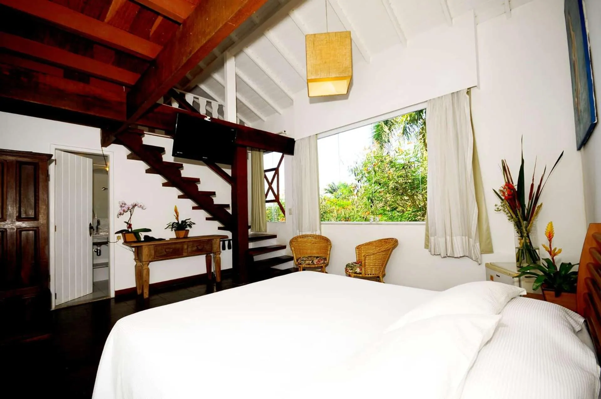 Photo of the whole room, Bed in Pousada Pelicano